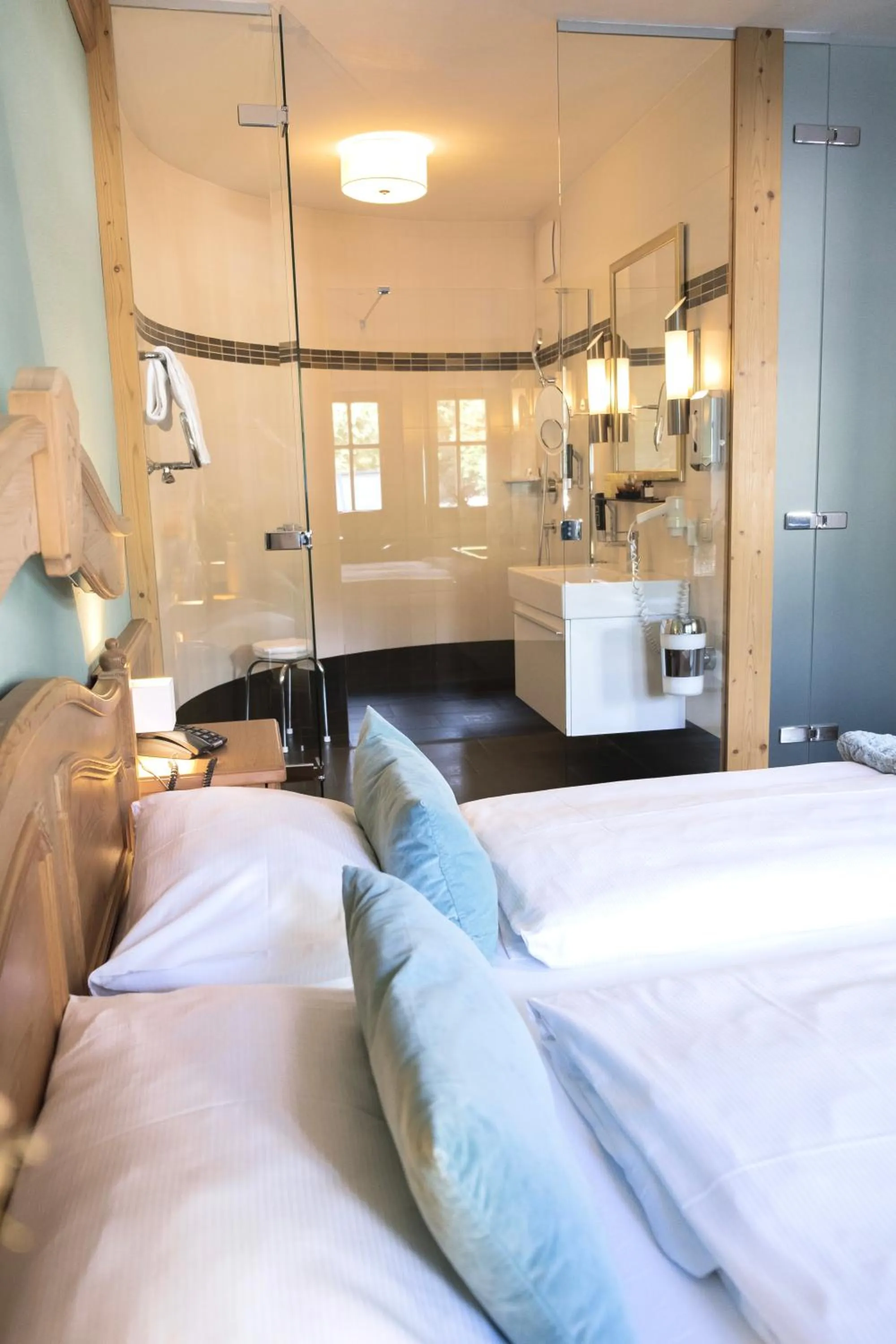 Bed in Boutiquehotel Hubertushof