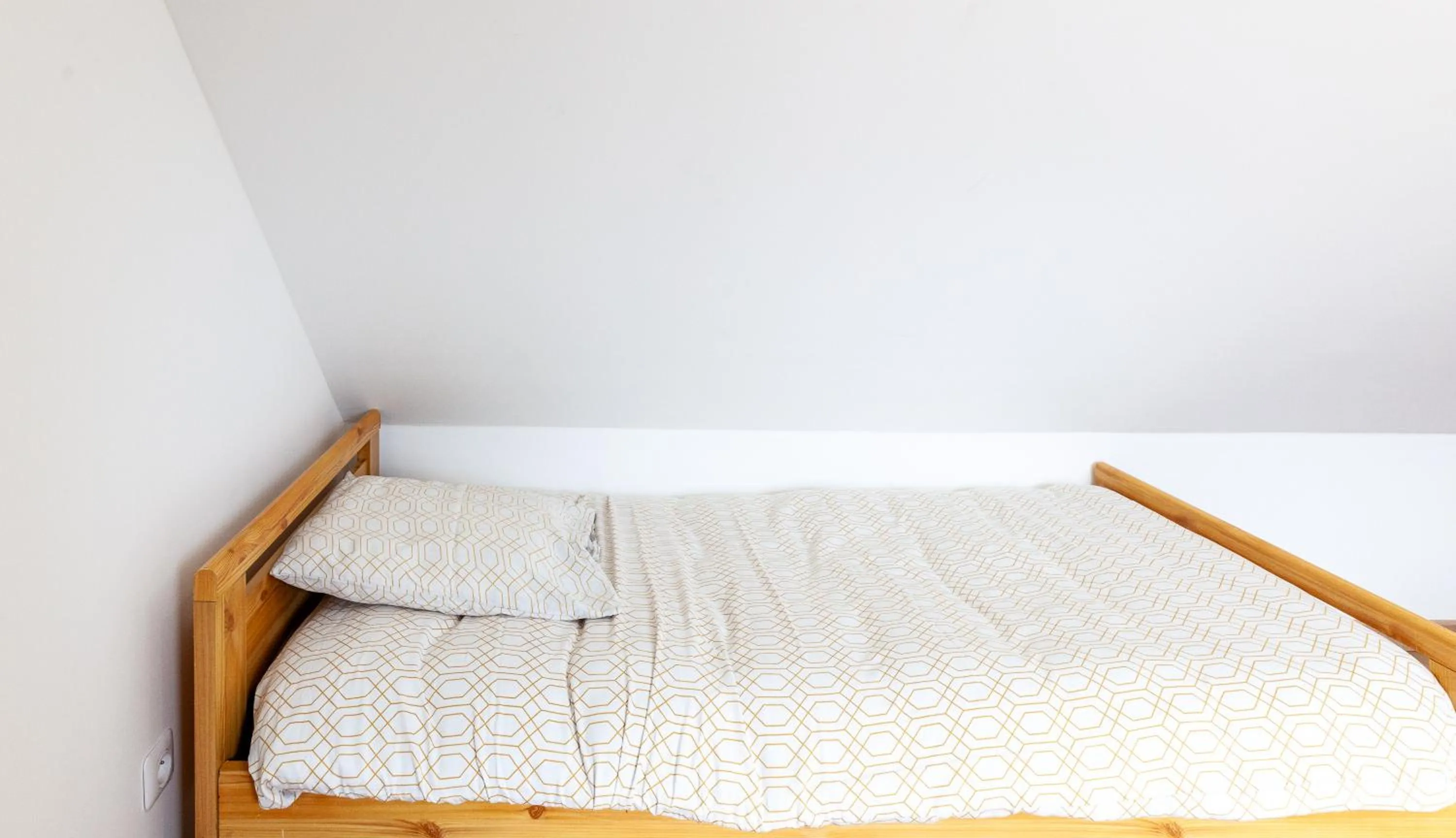 Bed in Espaces Gîtes