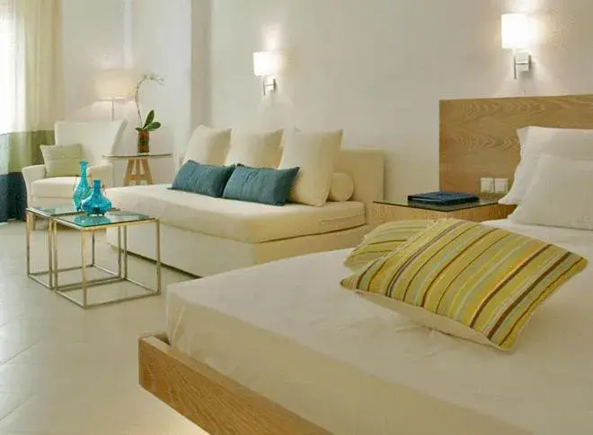 Bedroom, Bed in Petasos Beach Resort & Spa - Small Luxury Hotels of the World Bedroom, Bed in Petasos Beach Resort & Spa - Small Luxury Hotels of the World
