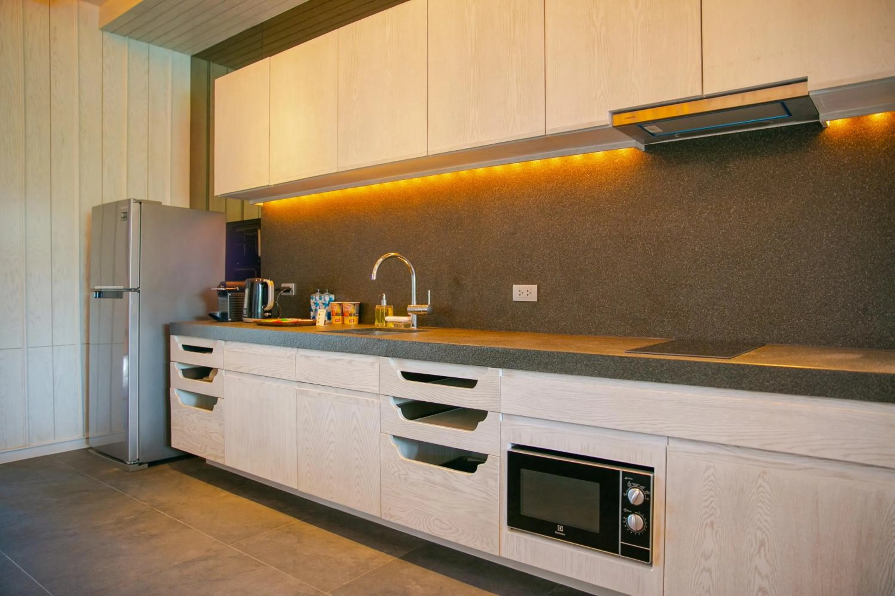 Kitchen or kitchenette in Baba Beach Club Natai Luxury Pool Villa Hotel by Sri panwa - SHA Plus