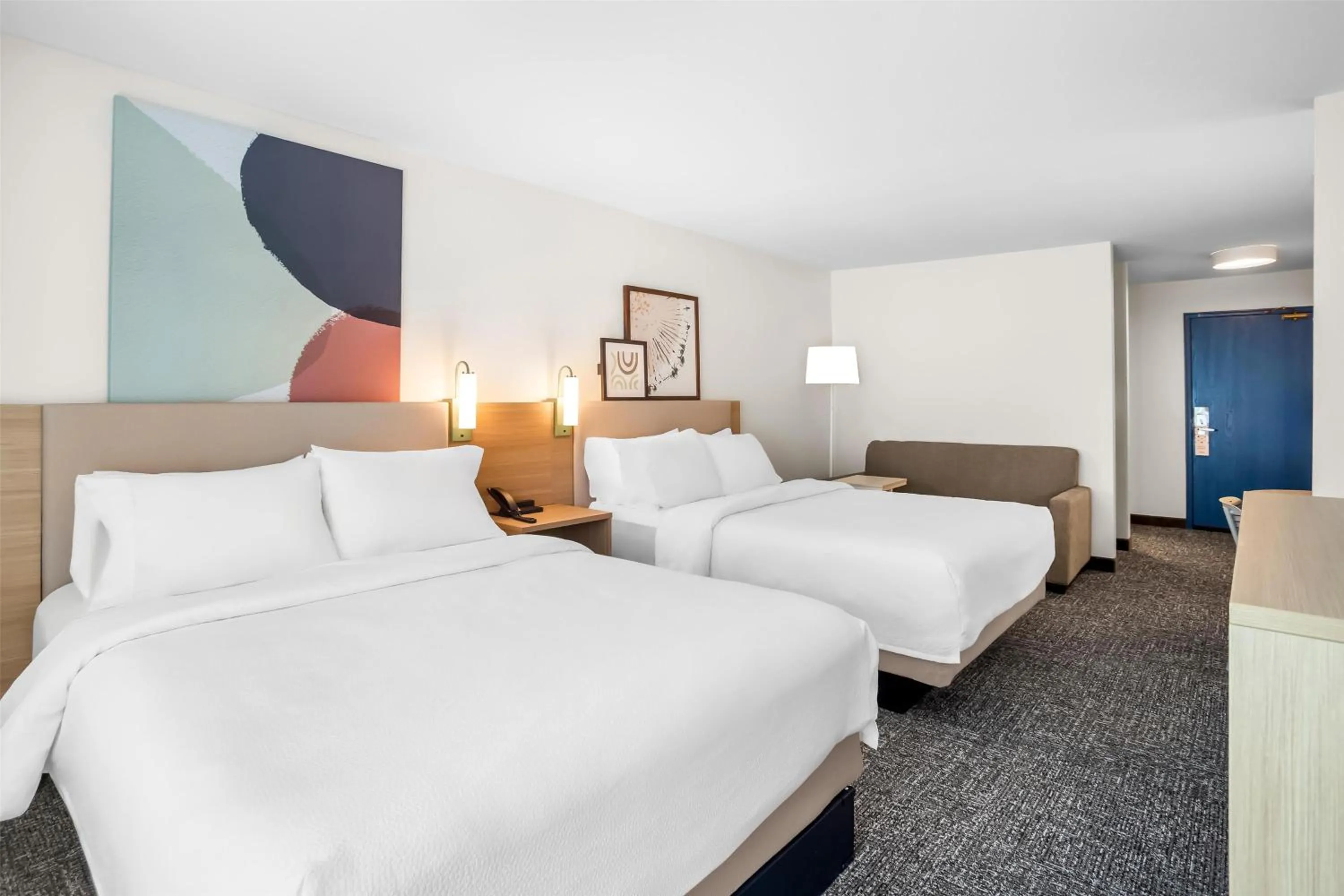 Living room, Bed in Spark by Hilton Tumwater