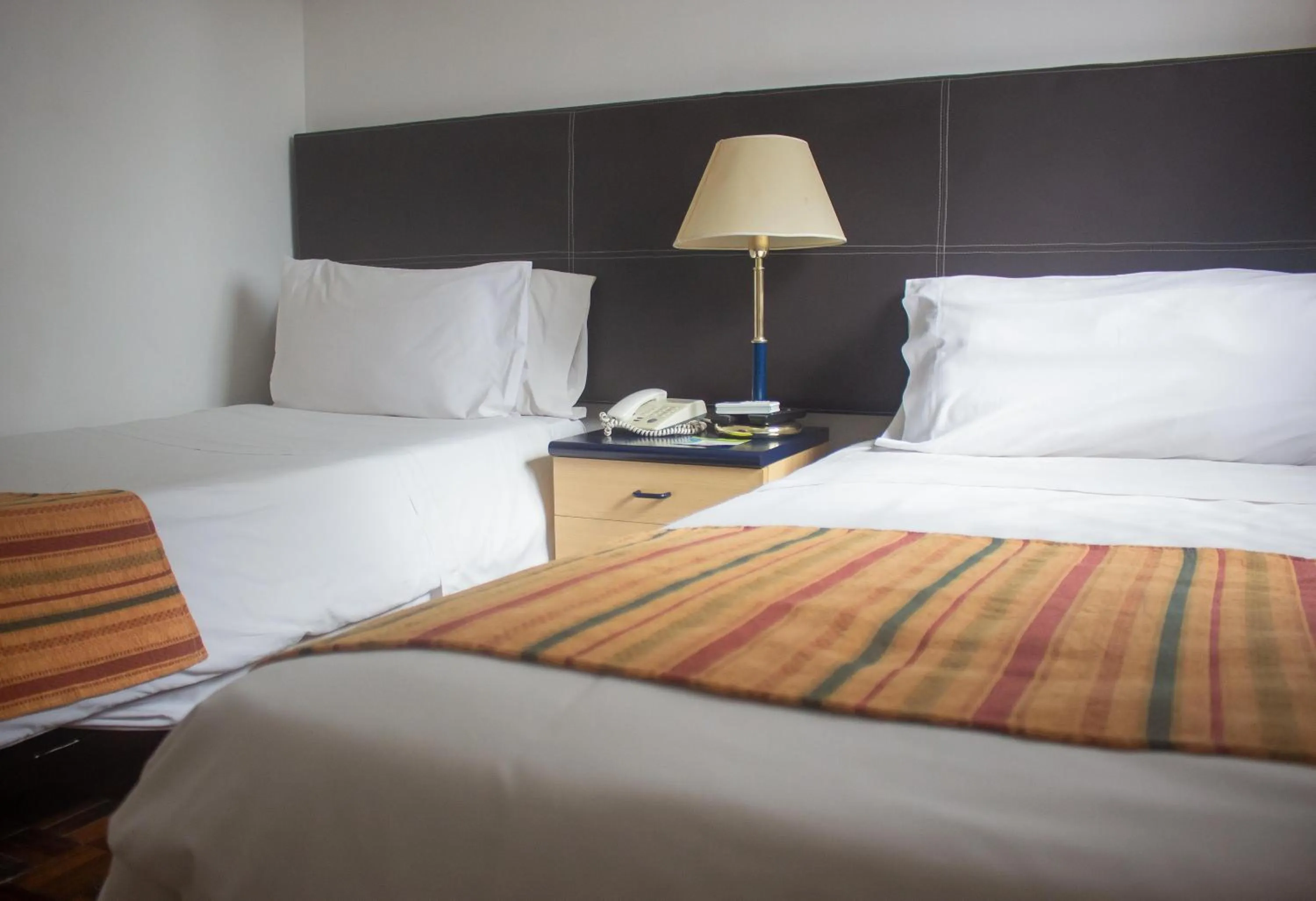 Bed in Hotel Cristoforo Colombo