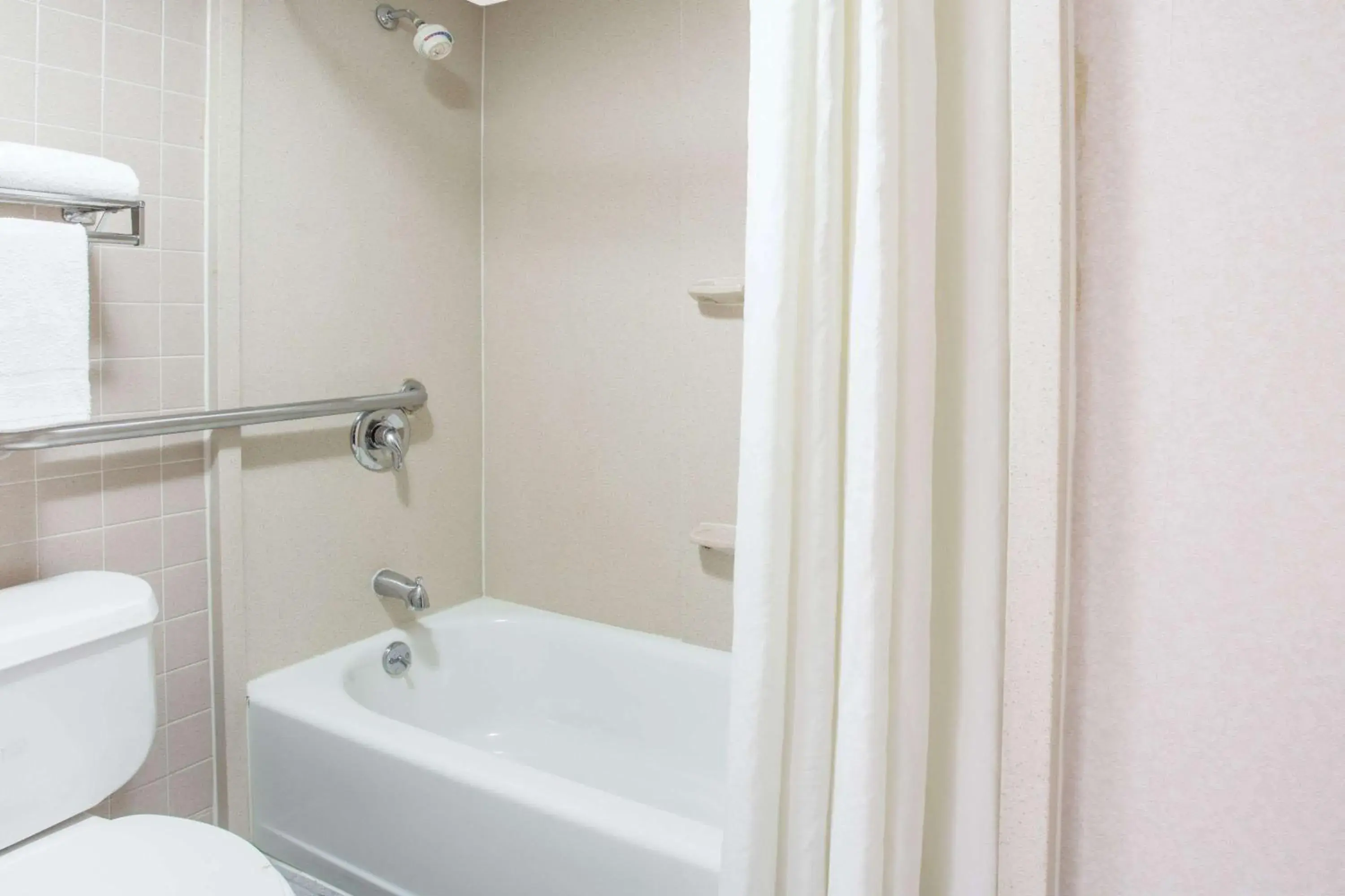 Bathroom in Super 8 by Wyndham Camp Springs/Andrews AFB DC Area Bathroom in Super 8 by Wyndham Camp Springs/Andrews AFB DC Area