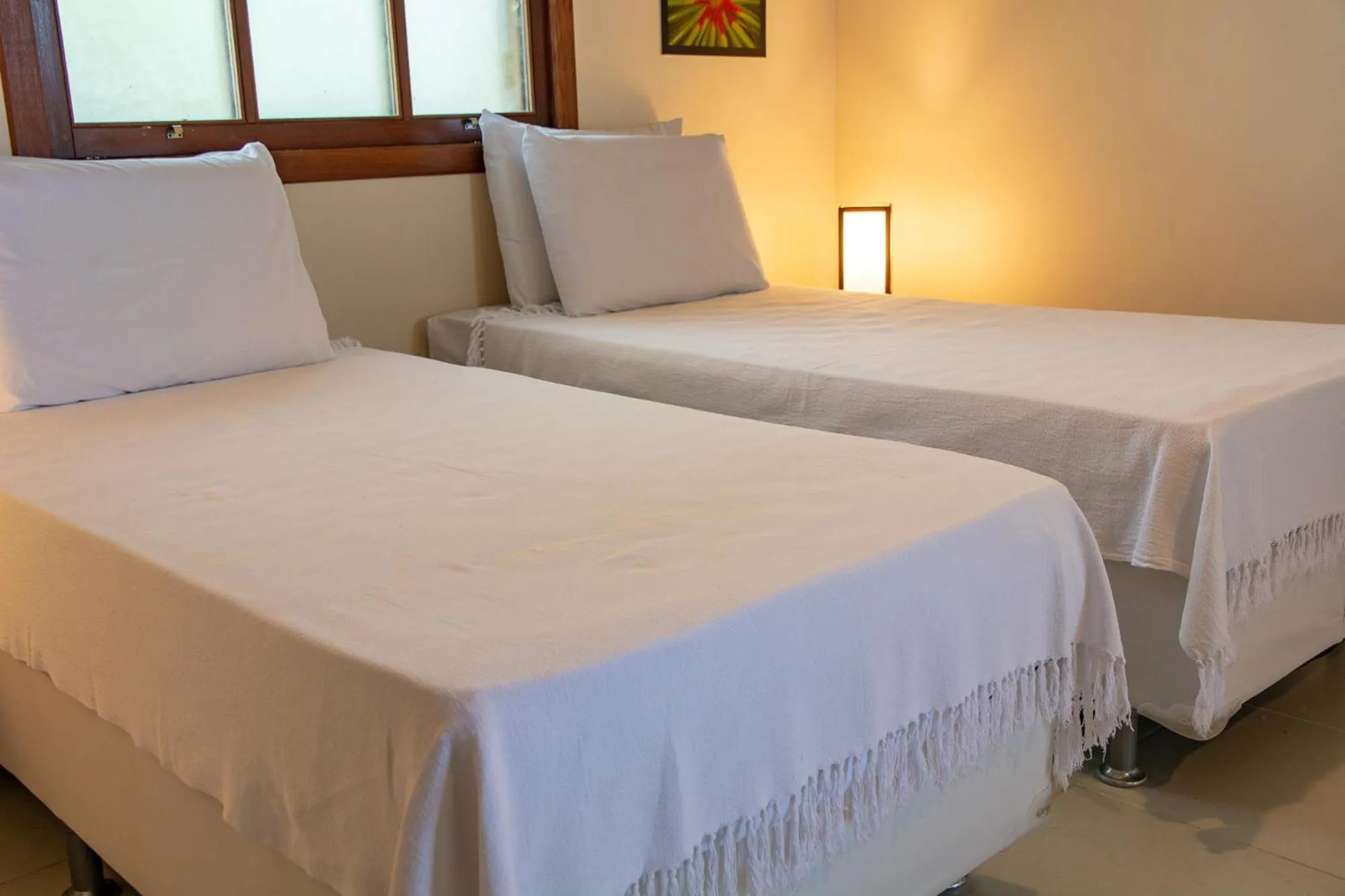 Bed in Pousada Erva Doce