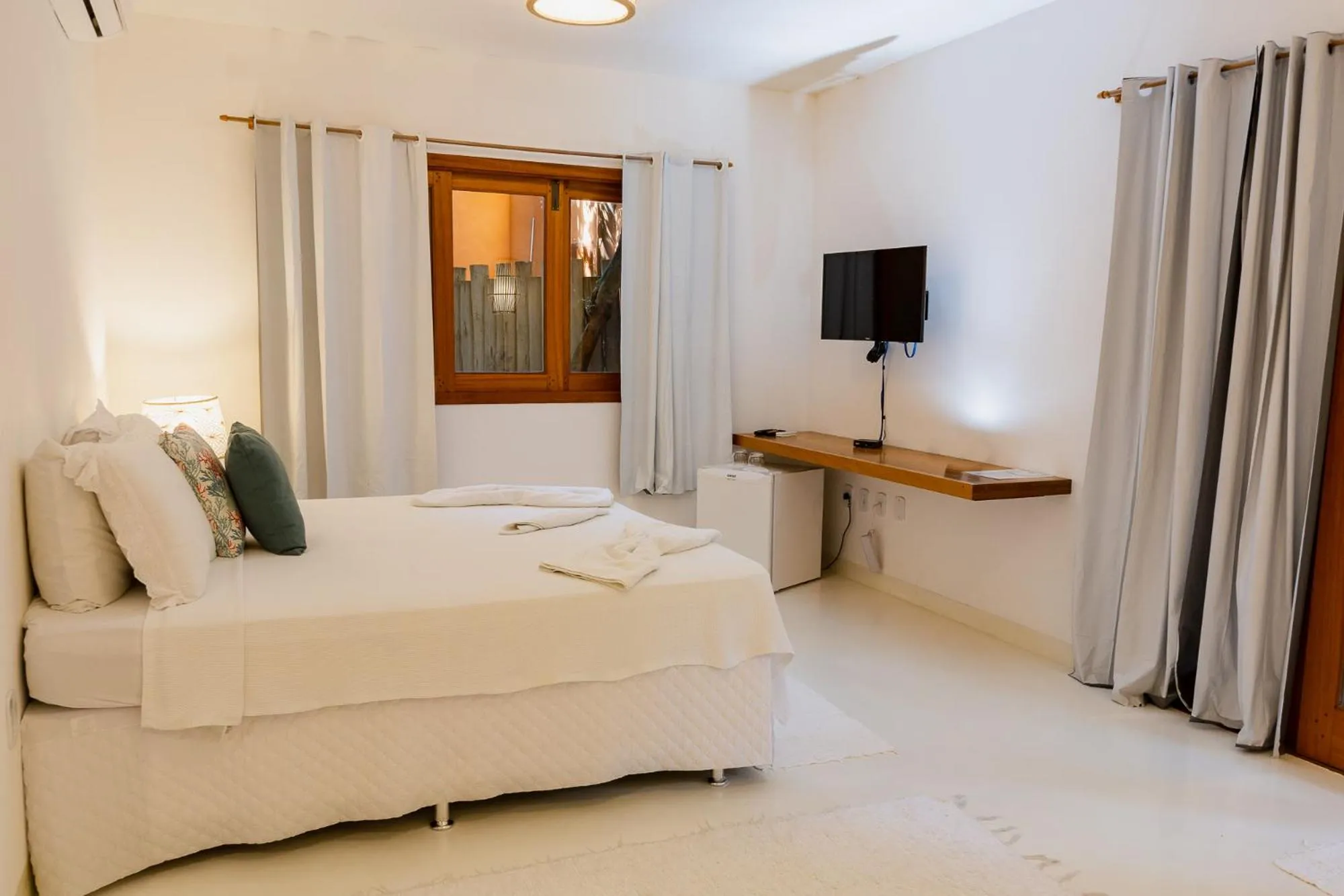 Bed in Pousada Erva Doce