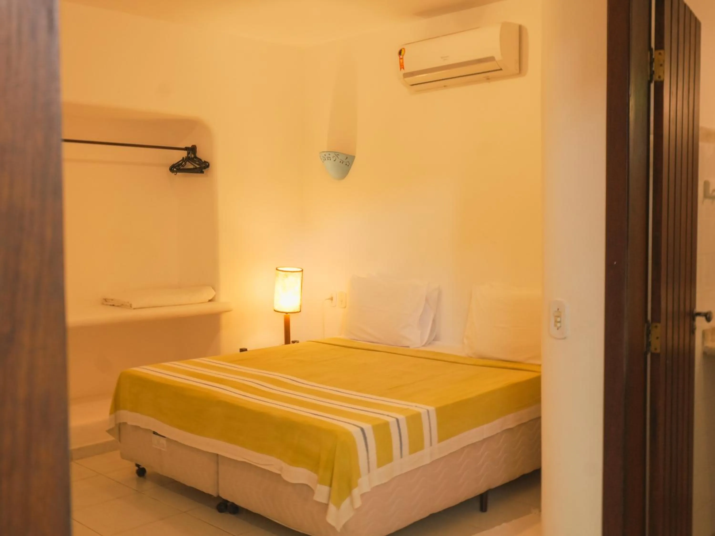 Bed in Pousada Erva Doce