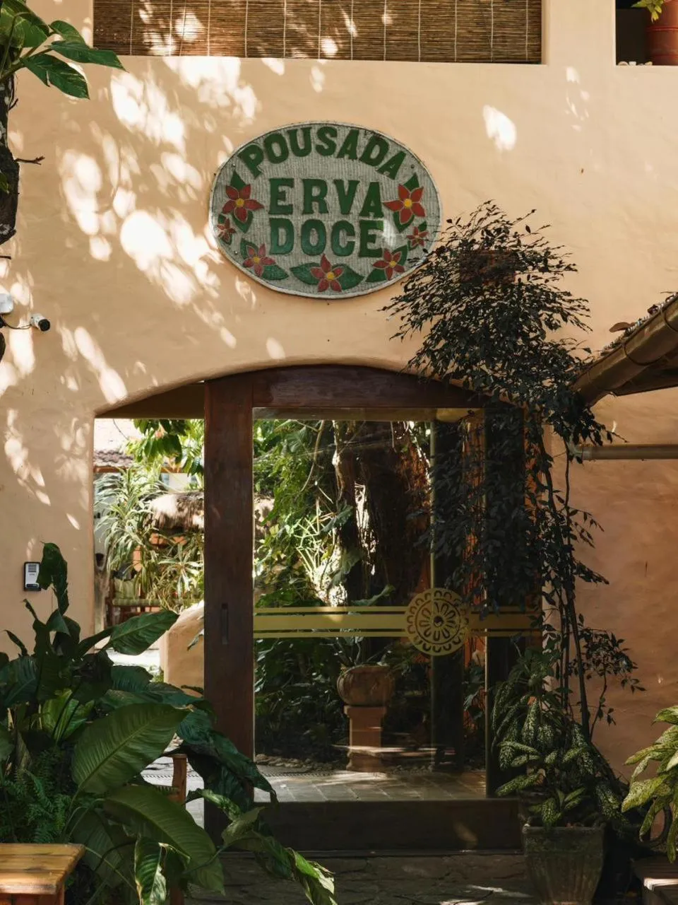 Property logo or sign in Pousada Erva Doce