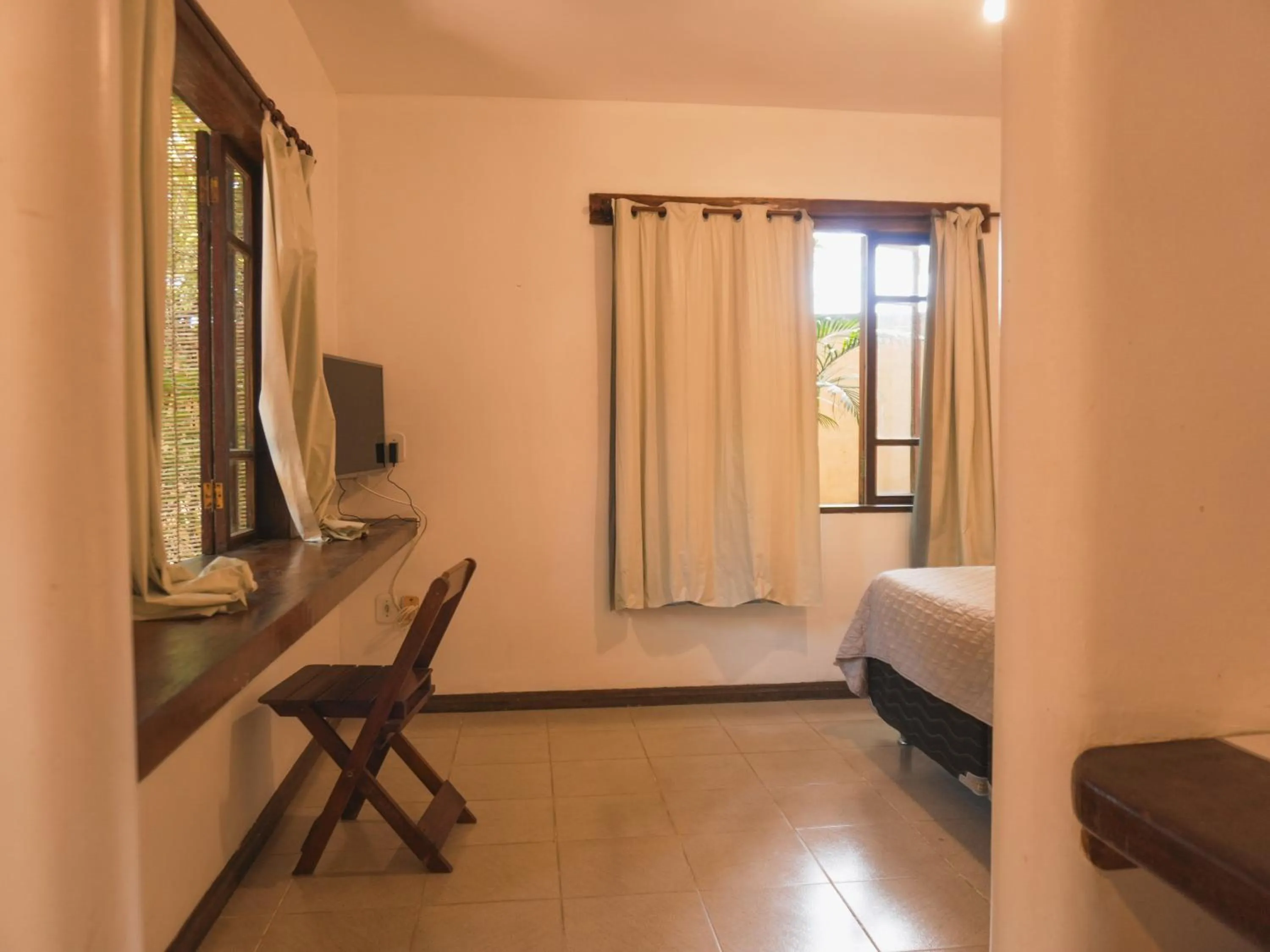 Bed in Pousada Erva Doce