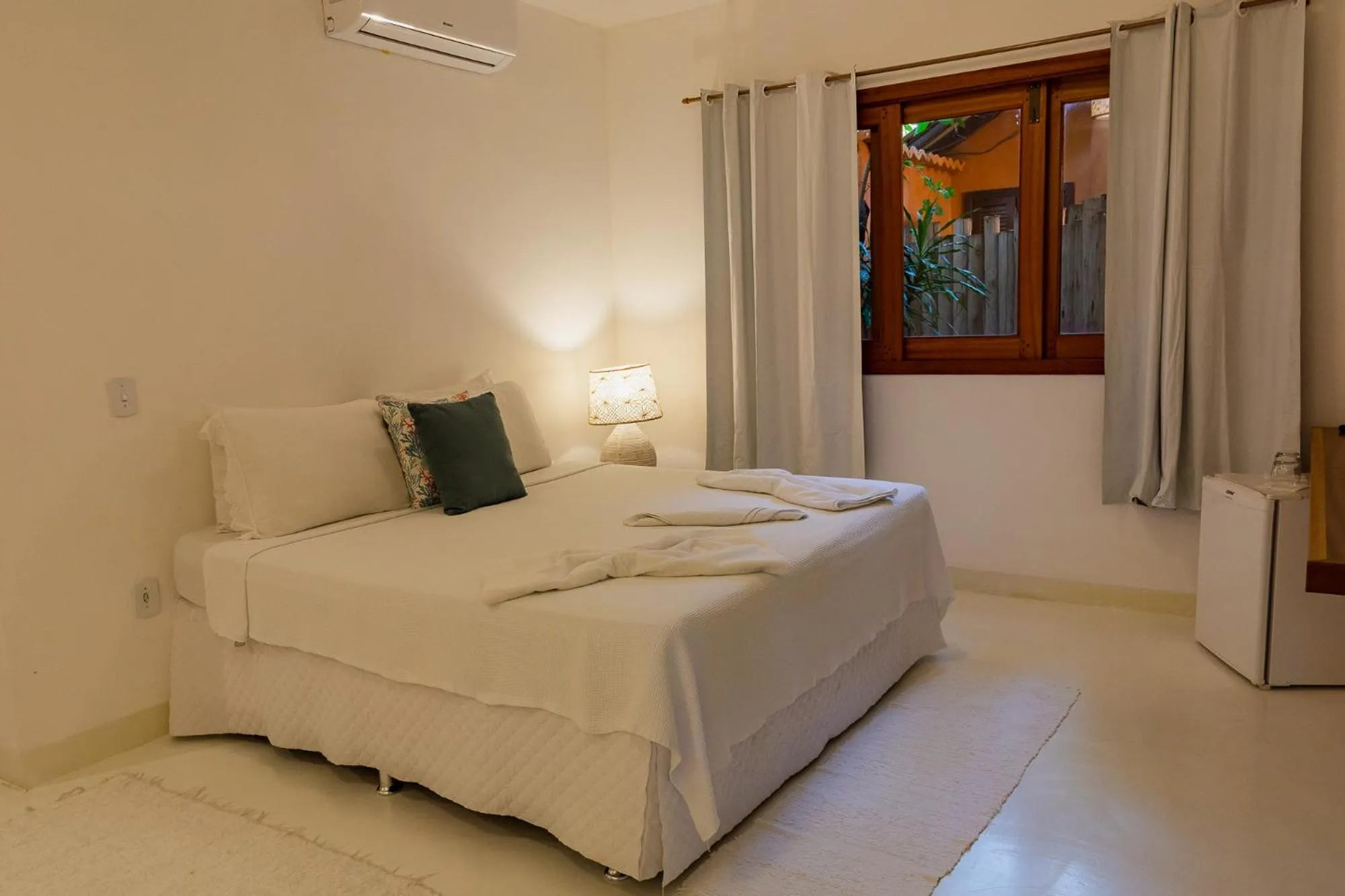 Bed in Pousada Erva Doce