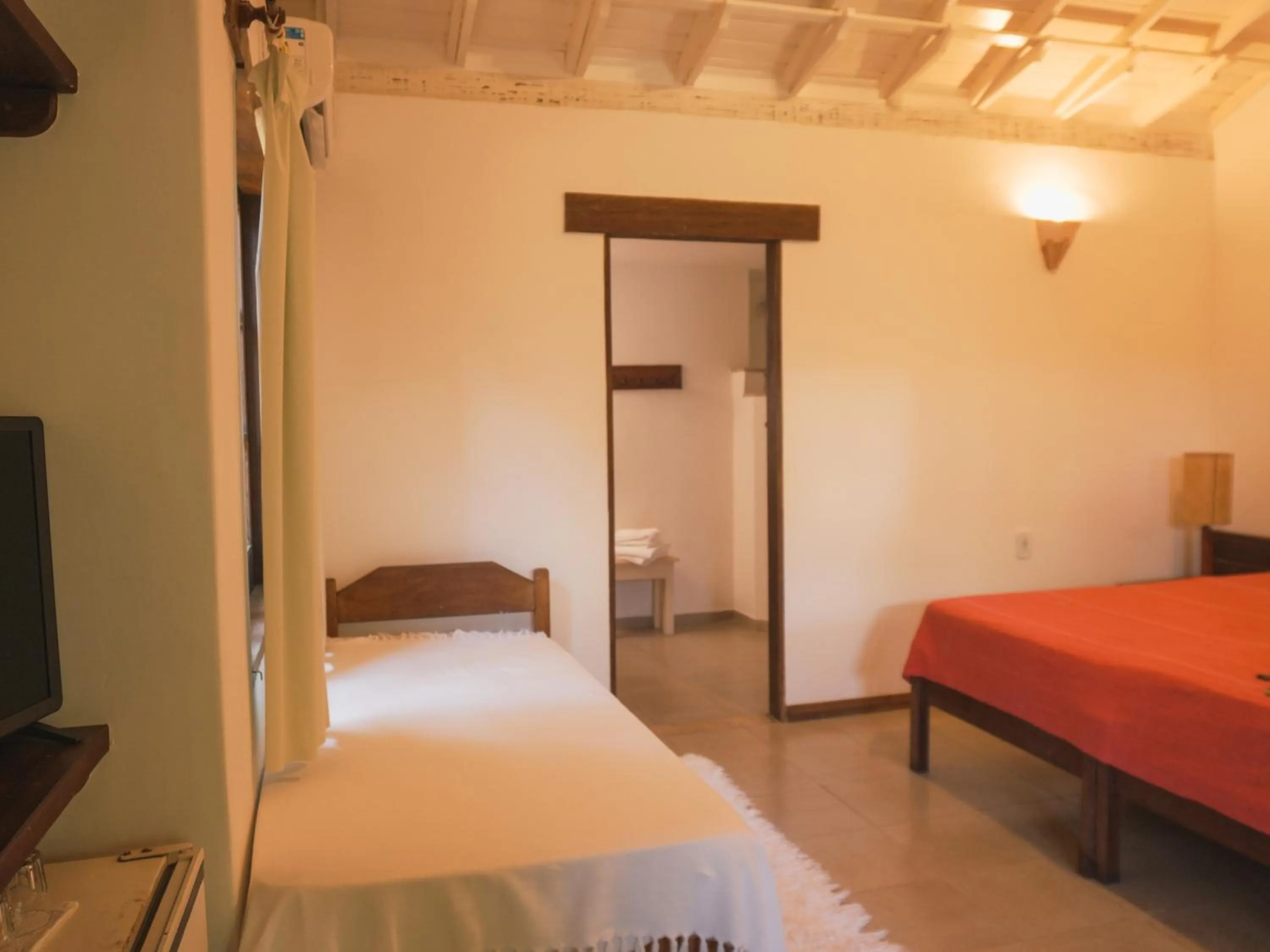 Bed in Pousada Erva Doce