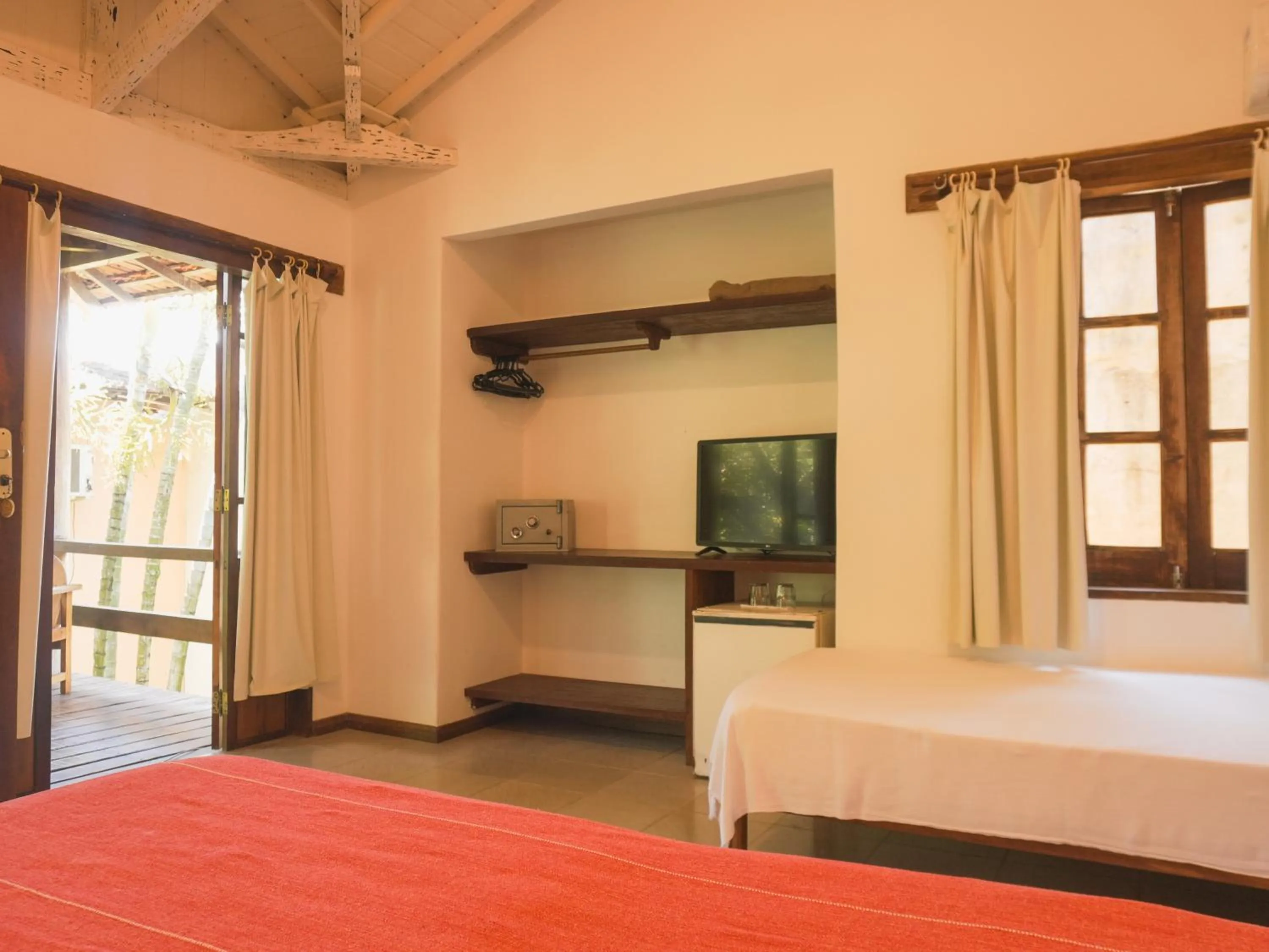 Bed in Pousada Erva Doce