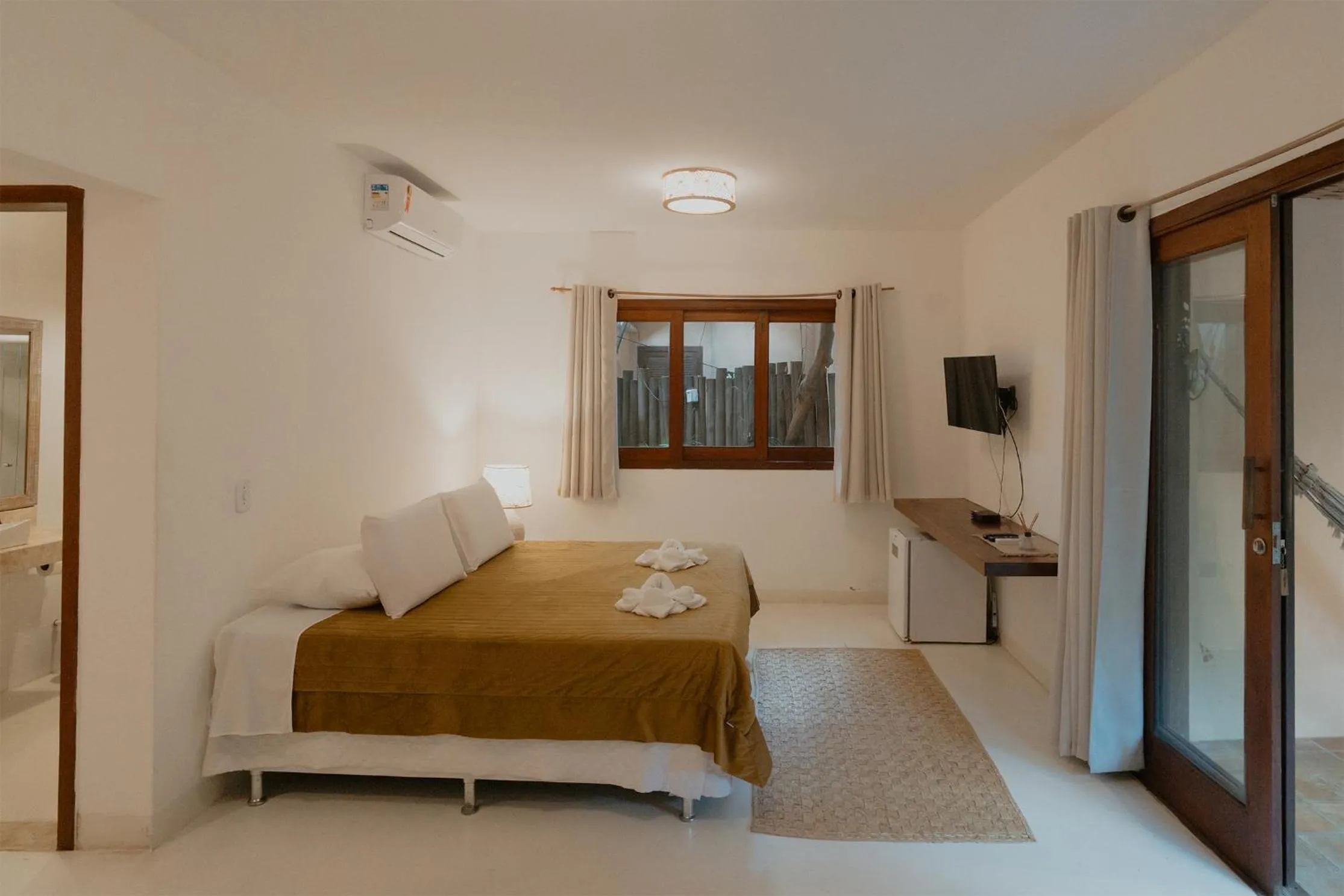 Photo of the whole room, Bed in Pousada Erva Doce