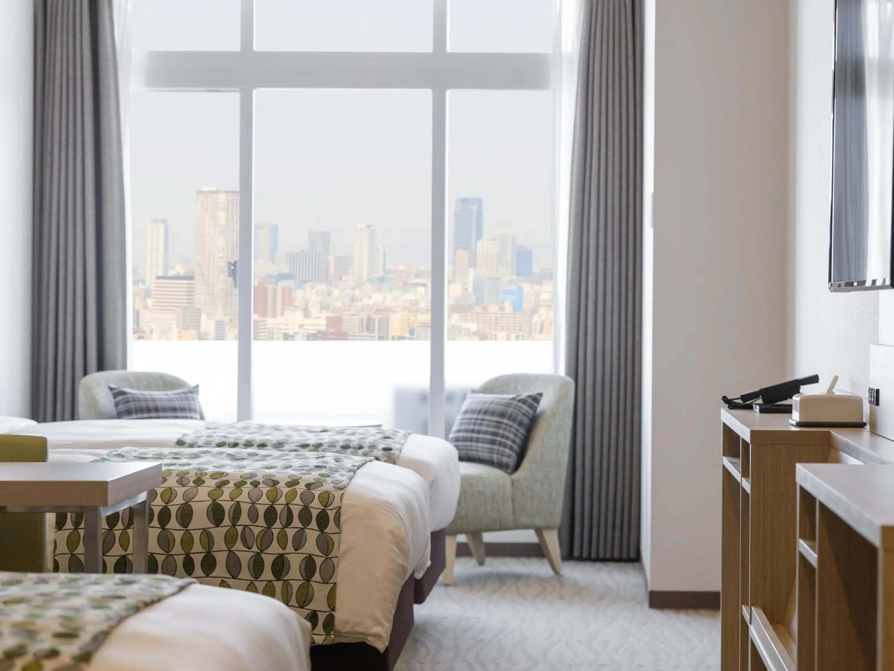 Photo of the whole room, Bed in Art Hotel Osaka Bay Tower