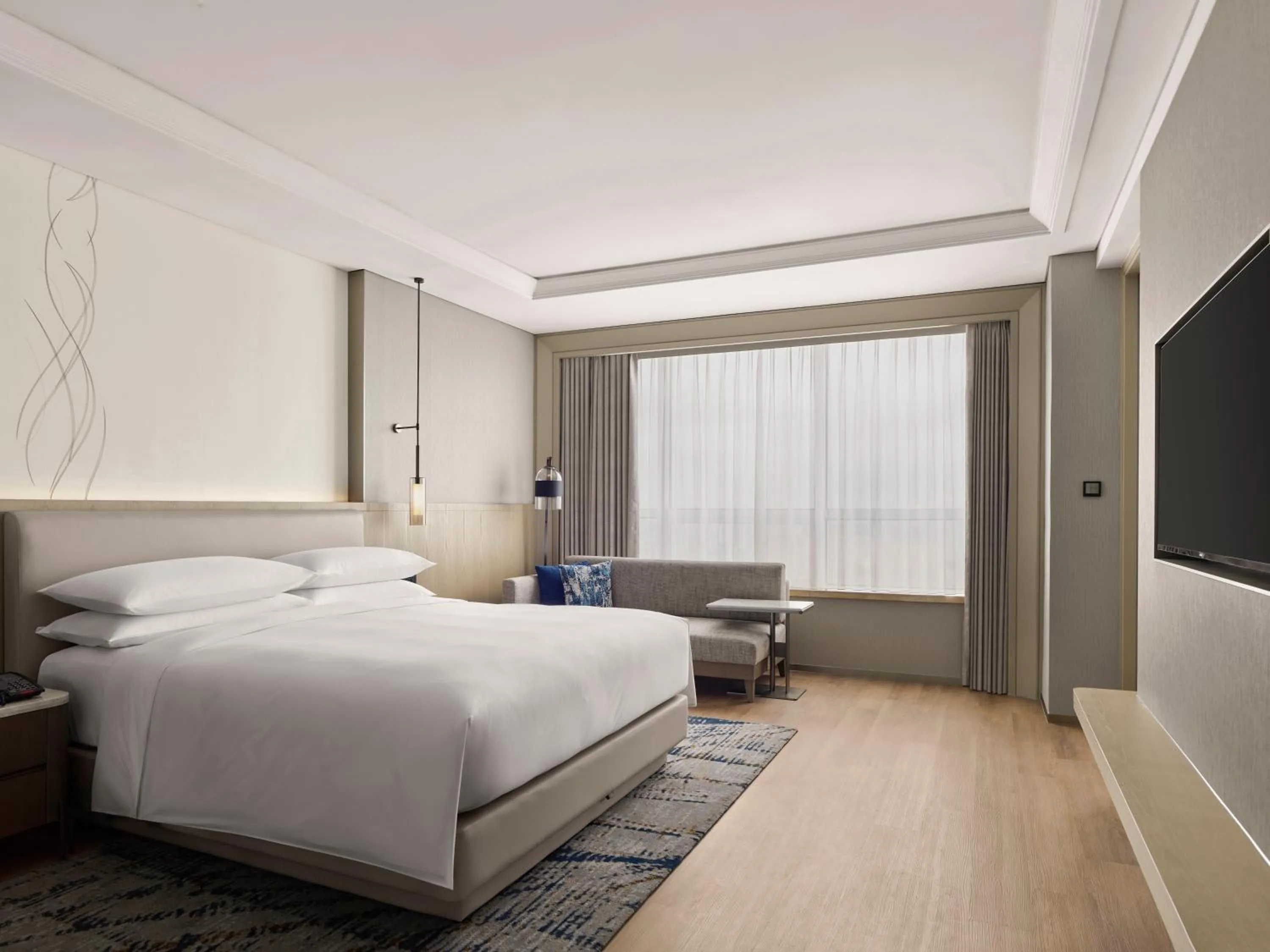 Bed in Shanghai Marriott Hotel Yangpu Riverside