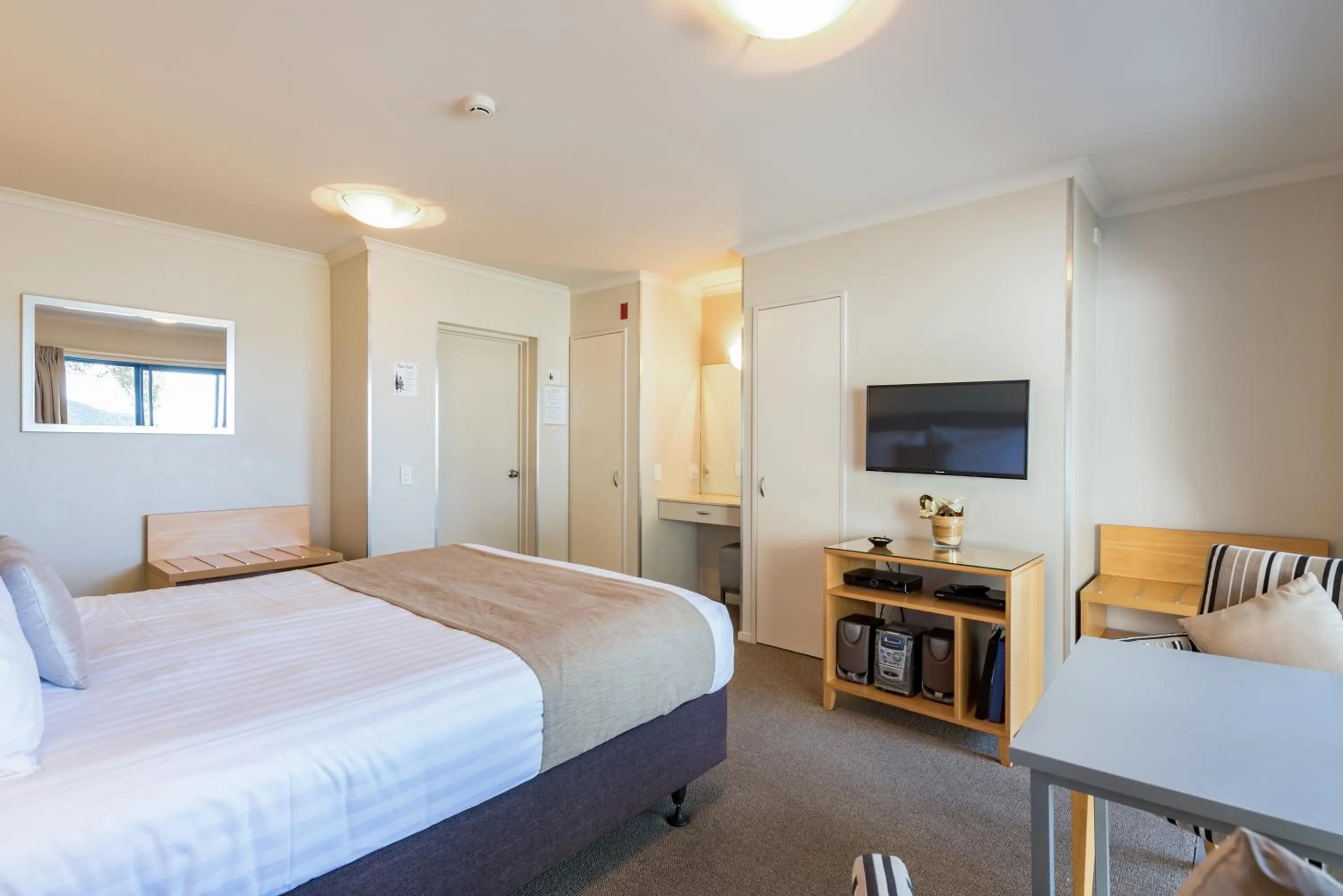 Bed in Blue Pacific Apartments