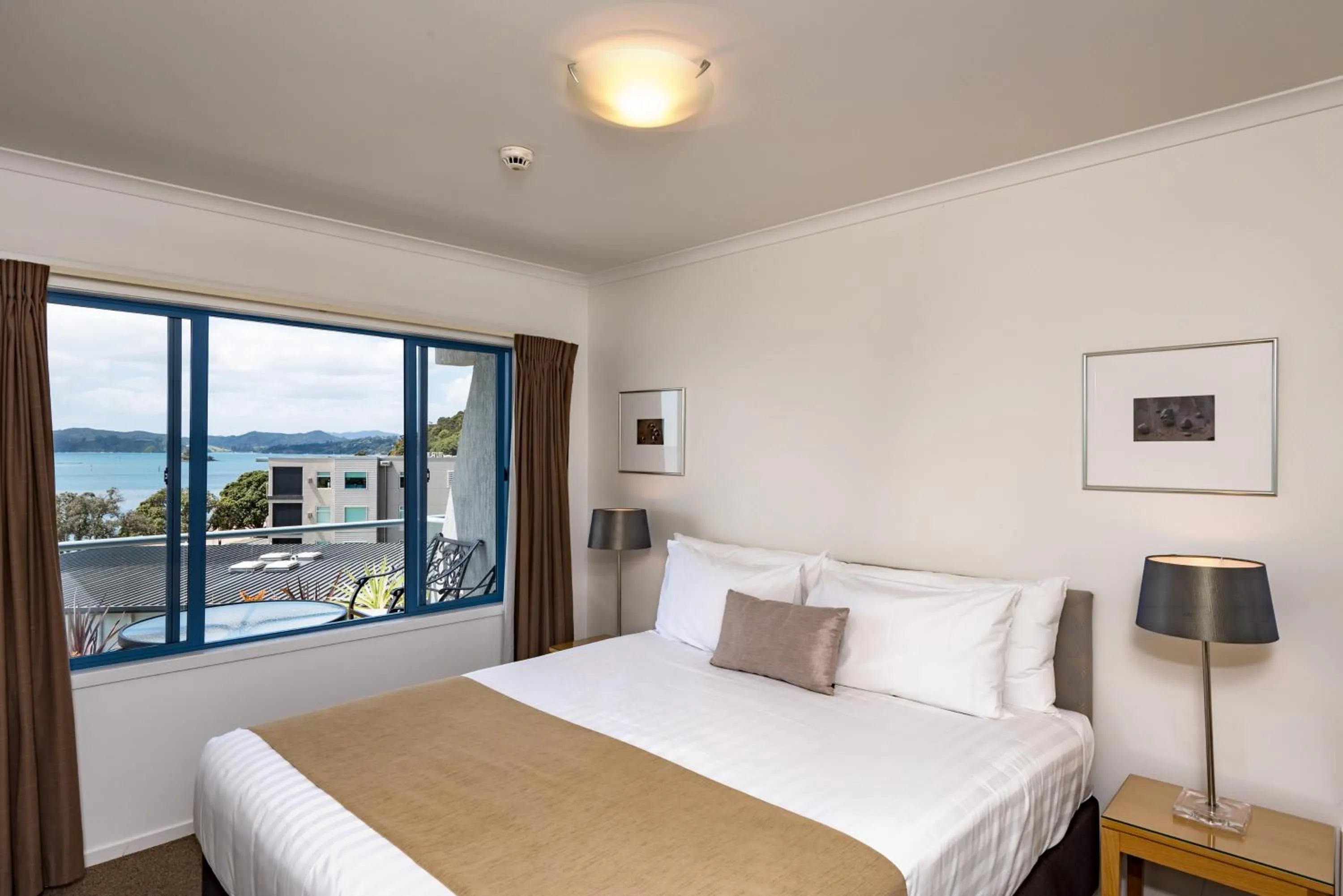 Bed in Blue Pacific Apartments