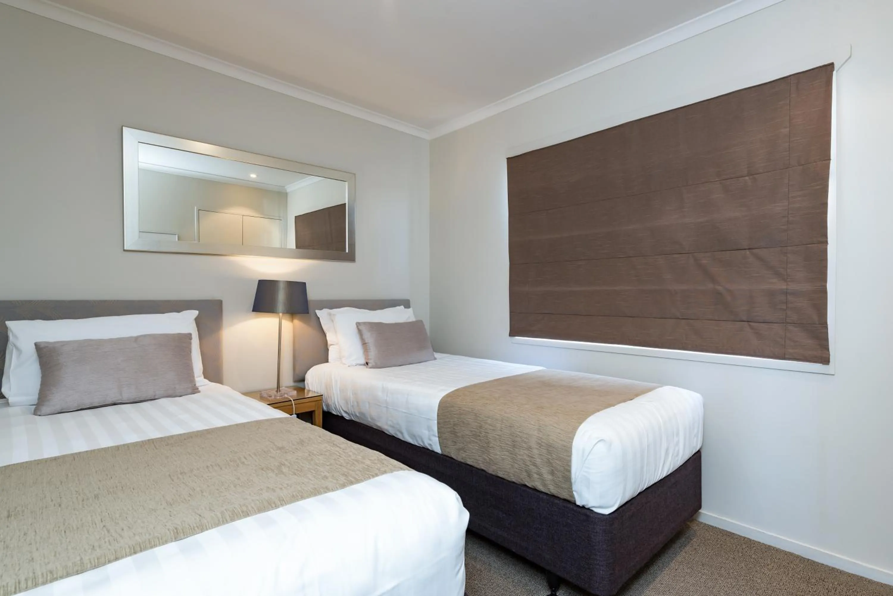 Bed in Blue Pacific Apartments