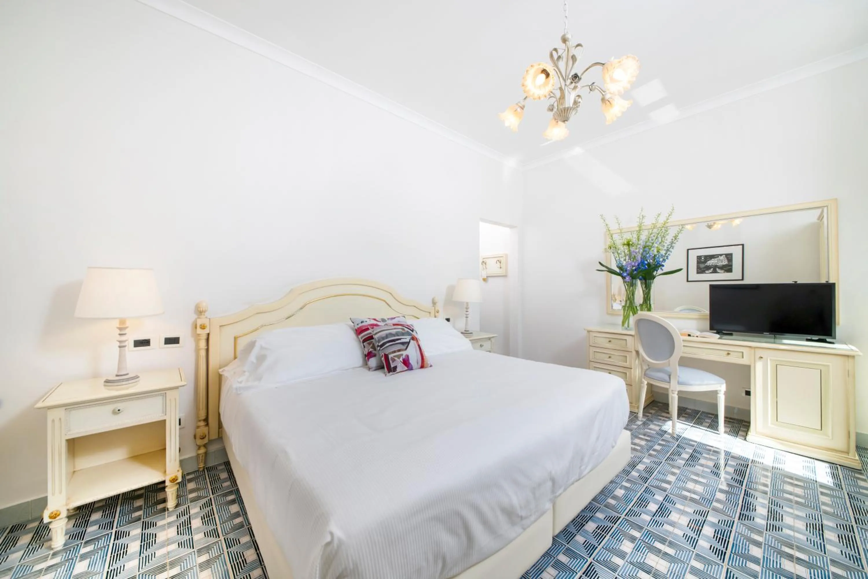 Bed in La Reginella Resort & Spa