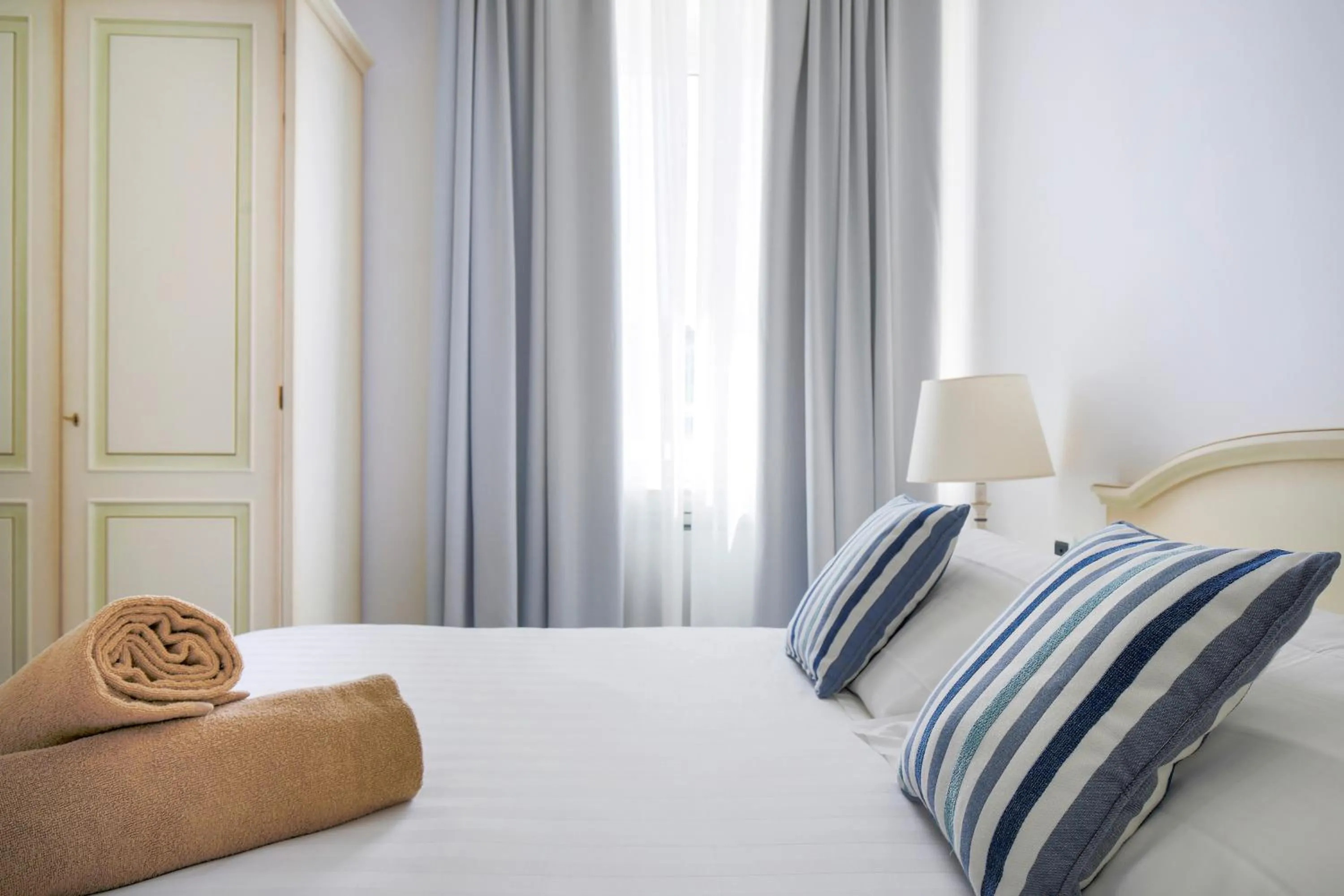 Bed in La Reginella Resort & Spa