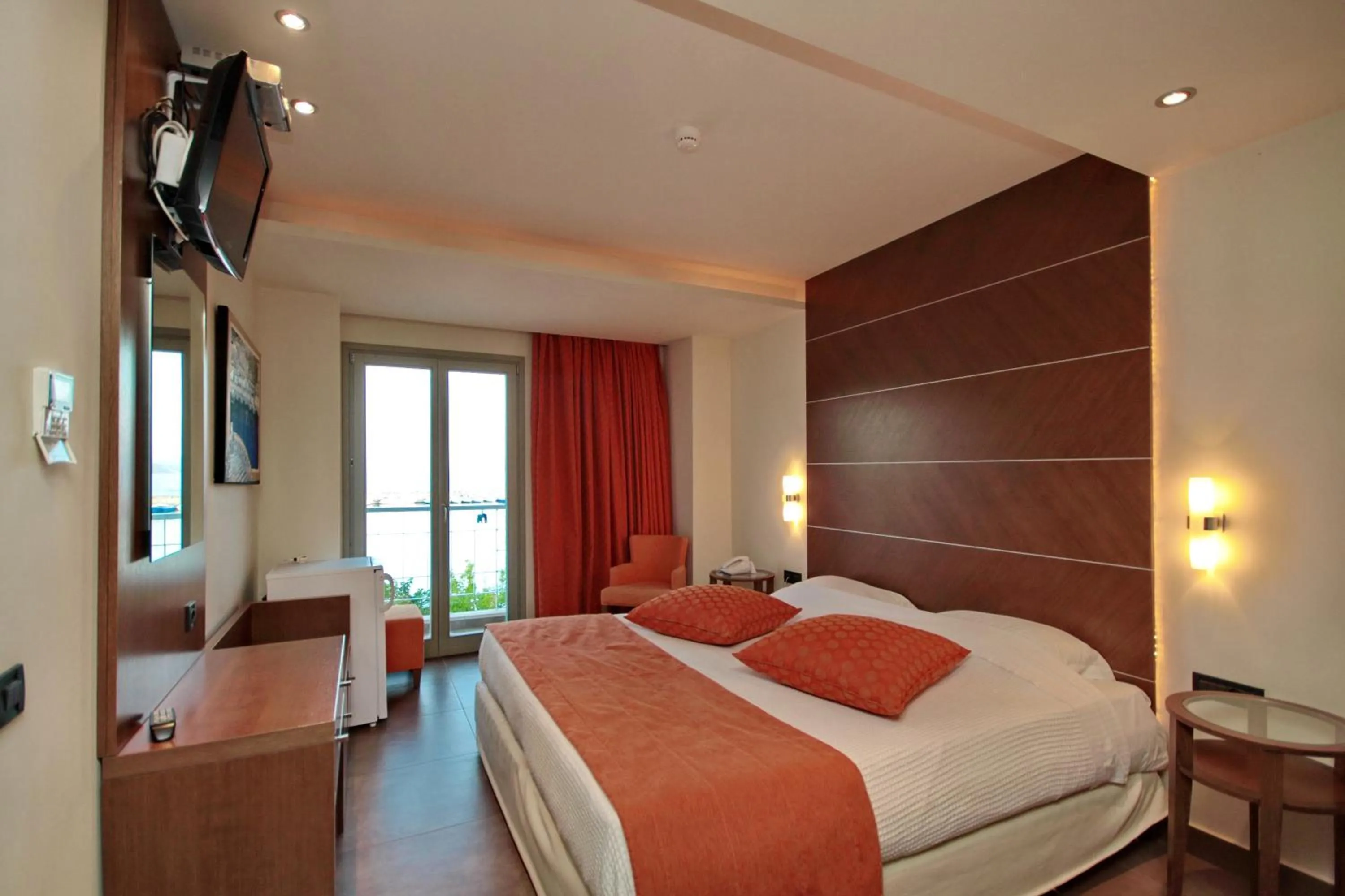 Bed in Astros Beach Boutique Hotel
