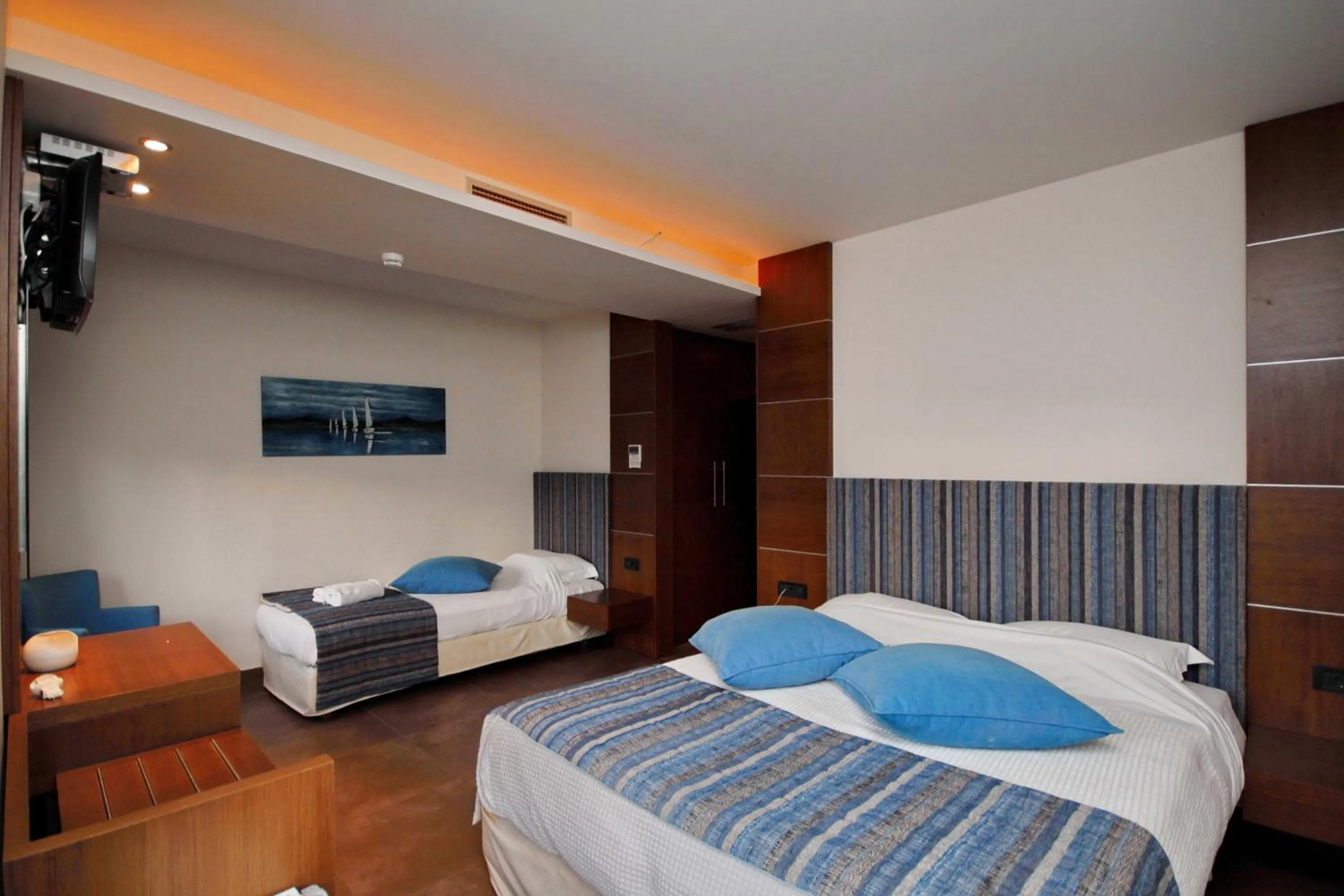 Bed in Astros Beach Boutique Hotel