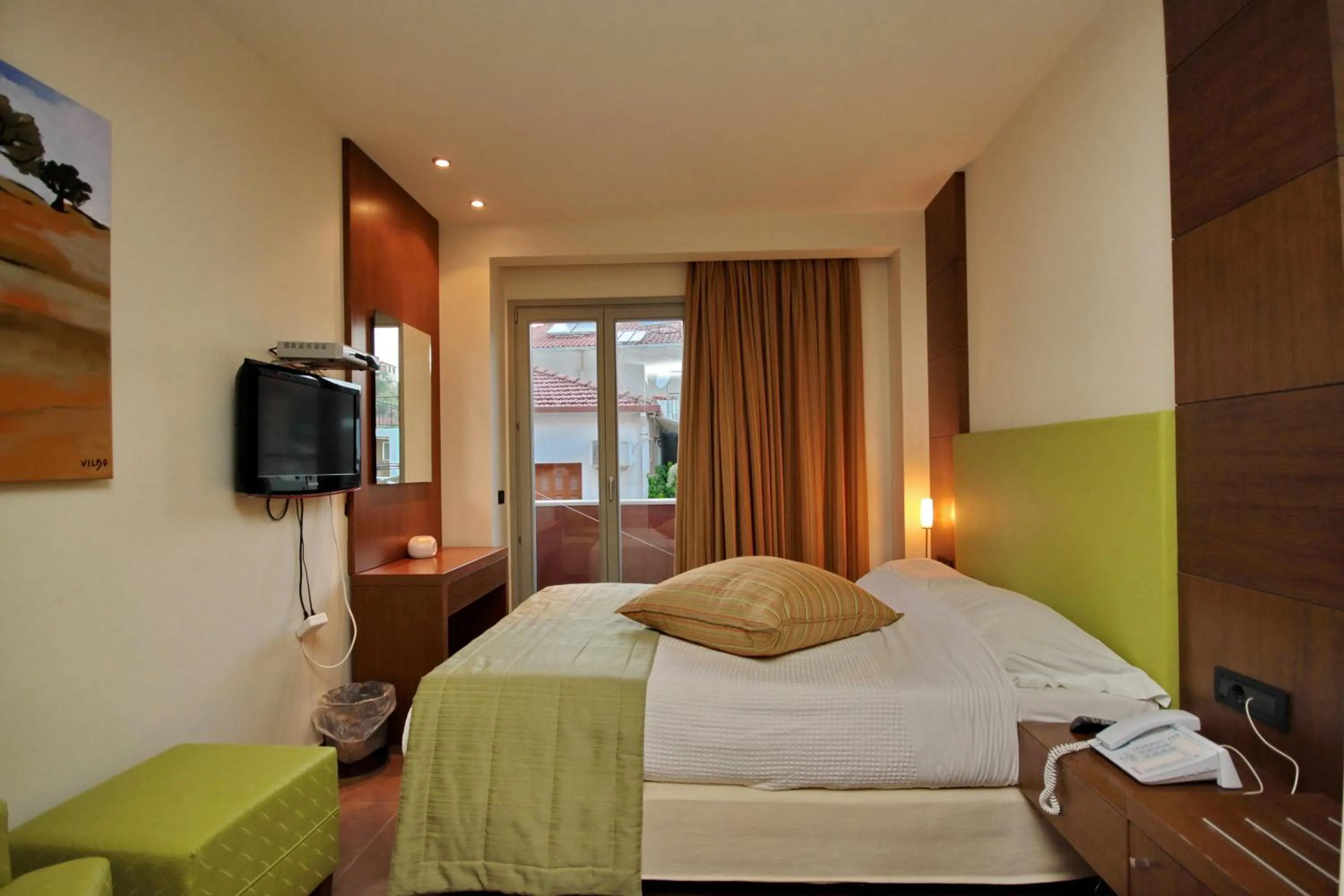 Photo of the whole room, Bed in Astros Beach Boutique Hotel