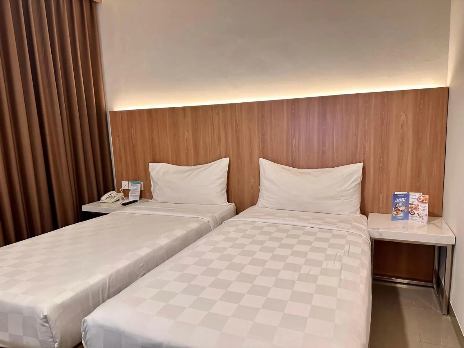 Bed in Royal Palm Hotel & Conference Center Cengkareng