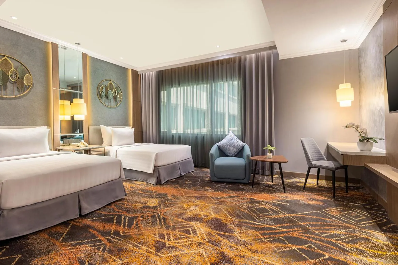 Bed in Aston Tropicana Hotel Bandung