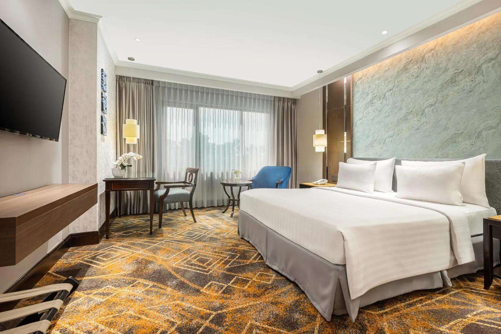 Bed in Aston Tropicana Hotel Bandung