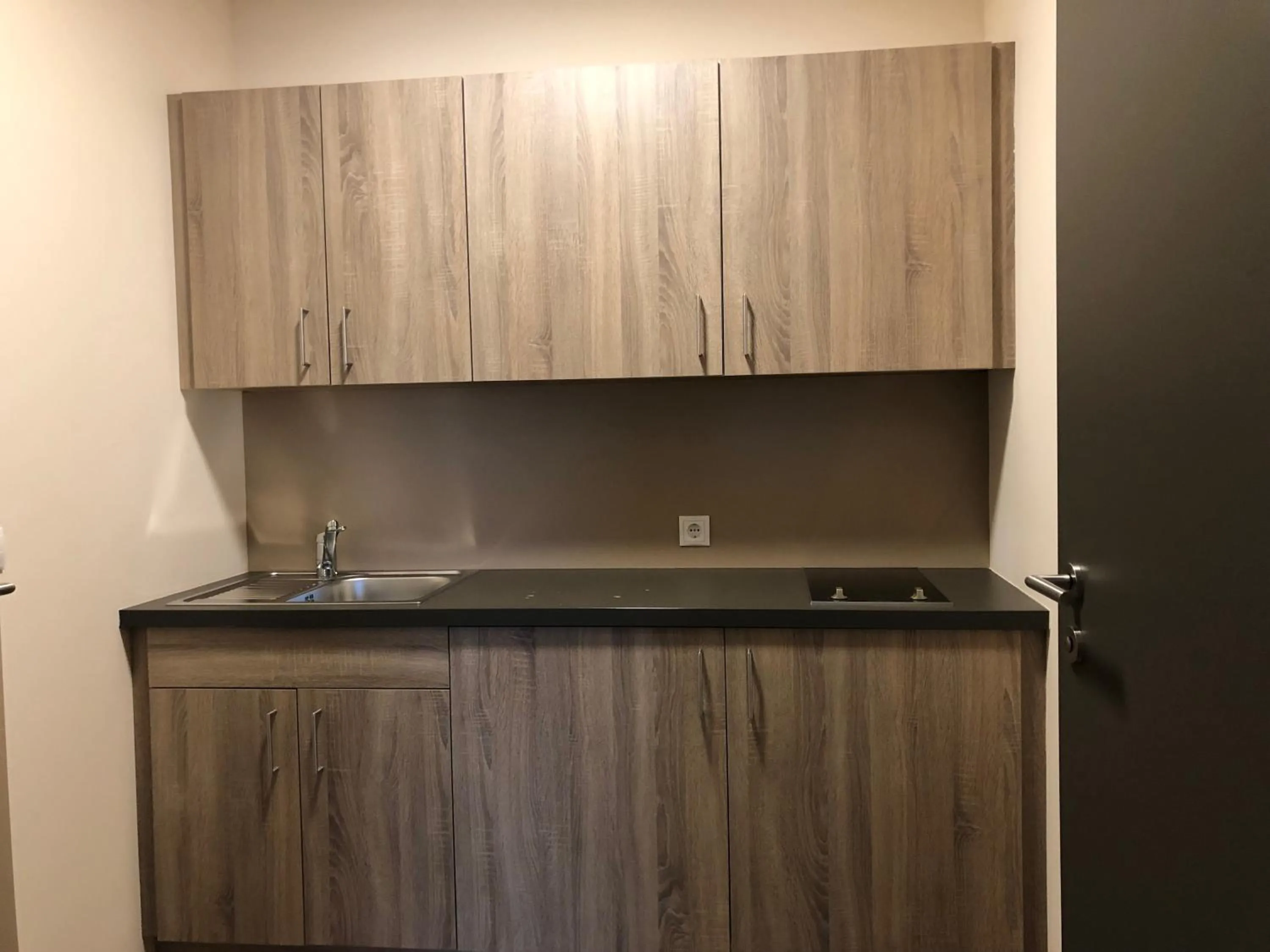 Kitchen or kitchenette in JUFA Hotel Graz Süd - Self Check-in