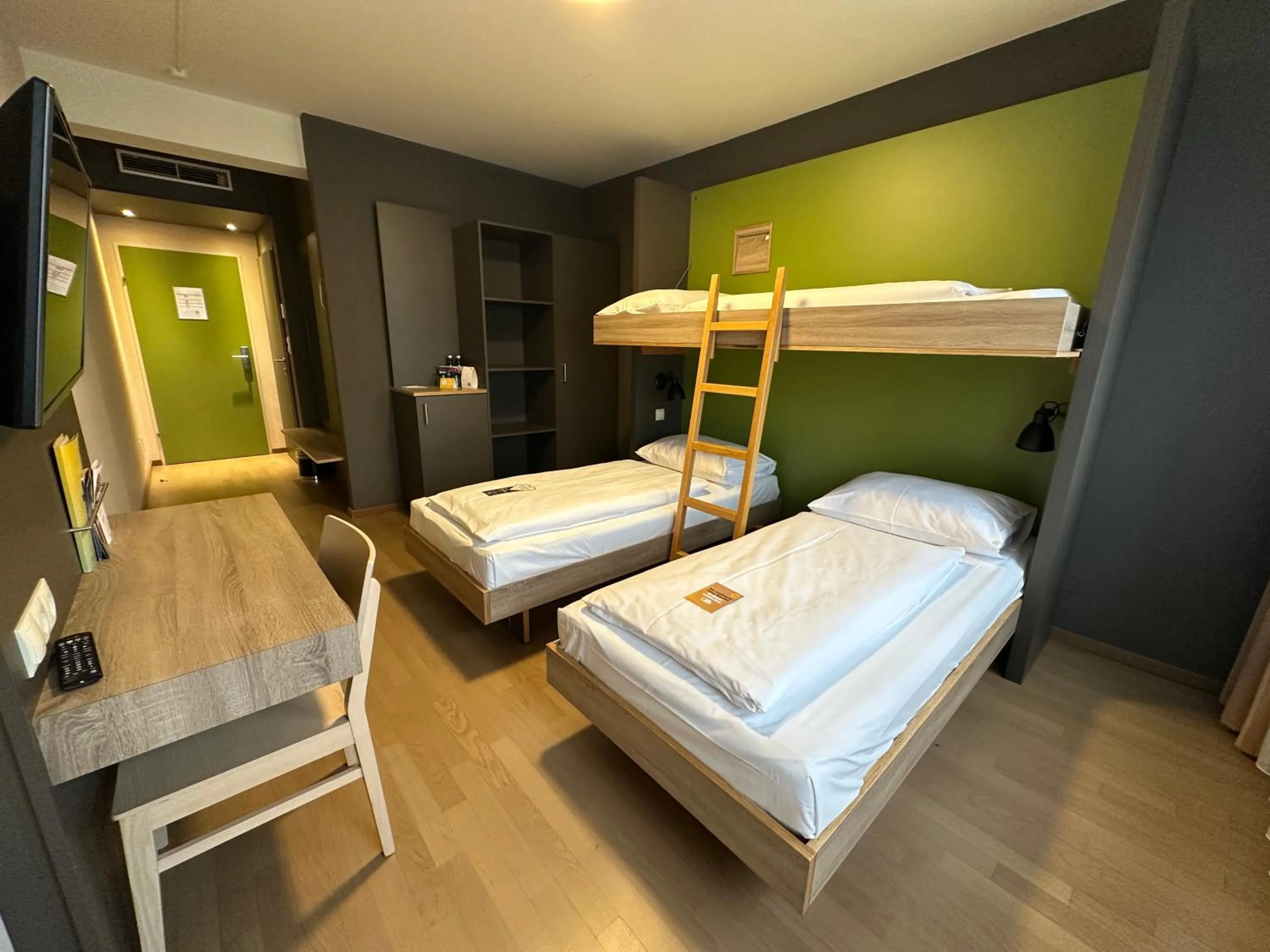 Photo of the whole room, Bed in JUFA Hotel Graz Süd - Self Check-in