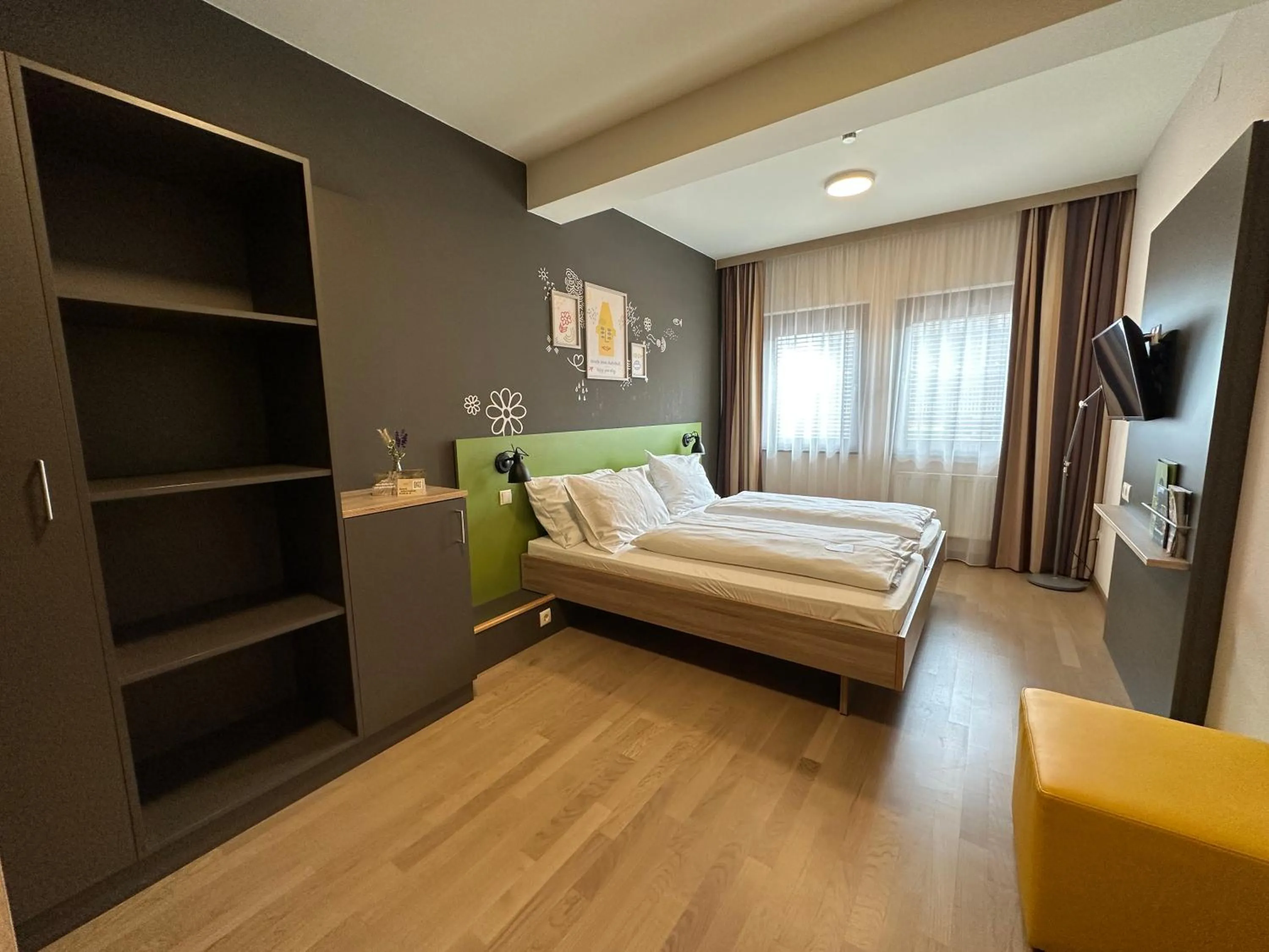 Photo of the whole room, Bed in JUFA Hotel Graz Süd - Self Check-in