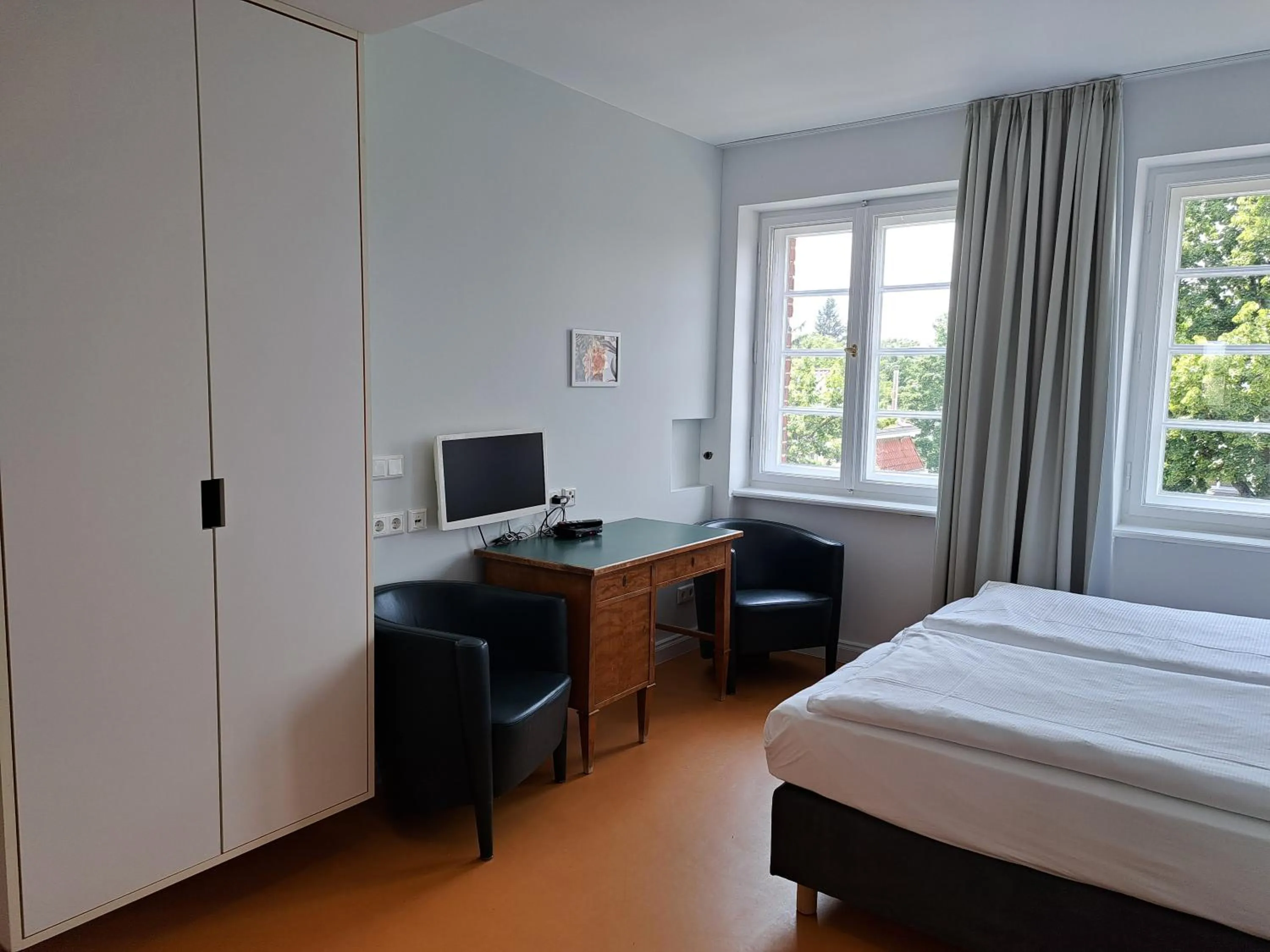 Photo of the whole room, Bed in Gäste- und Tagungshaus am Glockengarten