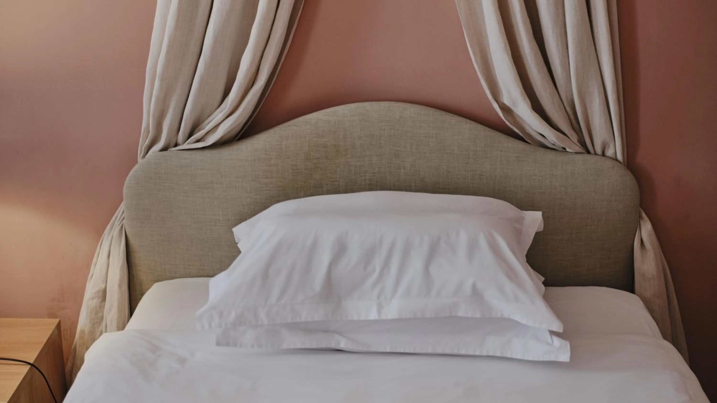 Bed in Vozdvyzhensky Boutique Hotel