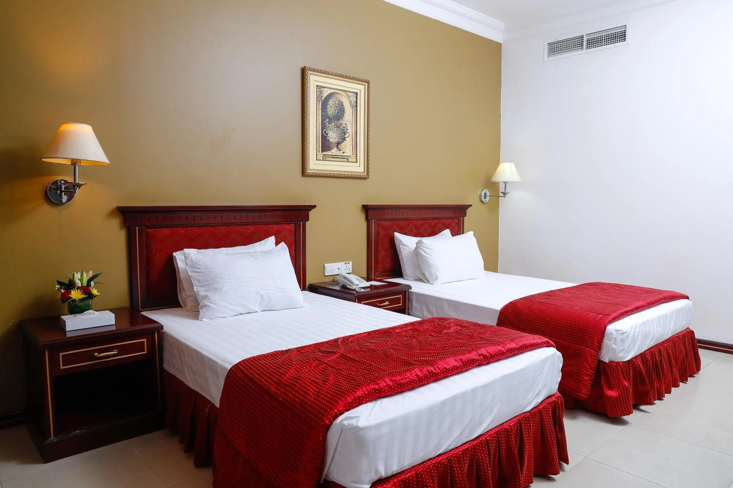 Bed in Taj Plaza Hotel