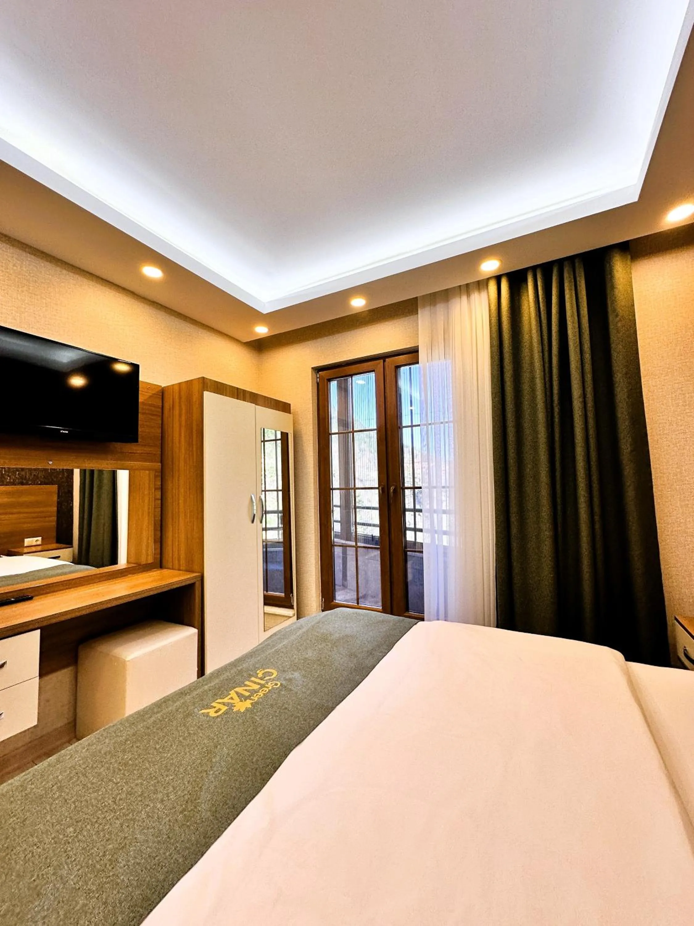 Bed in Green Cinar Apart