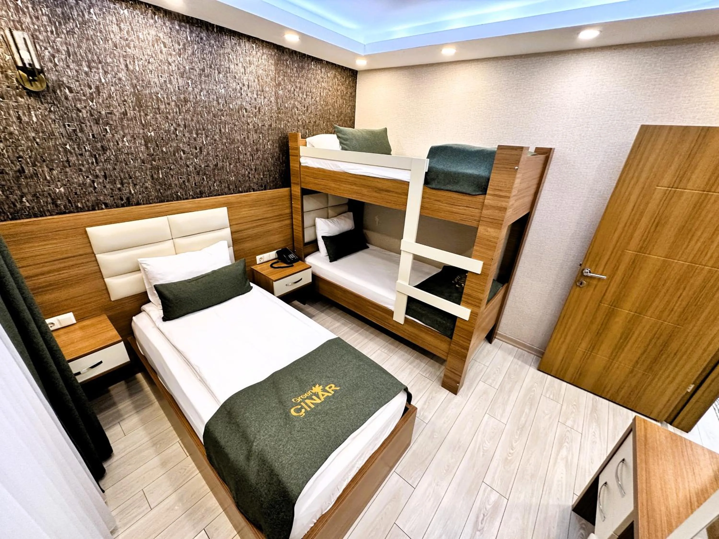 Bed in Green Cinar Apart