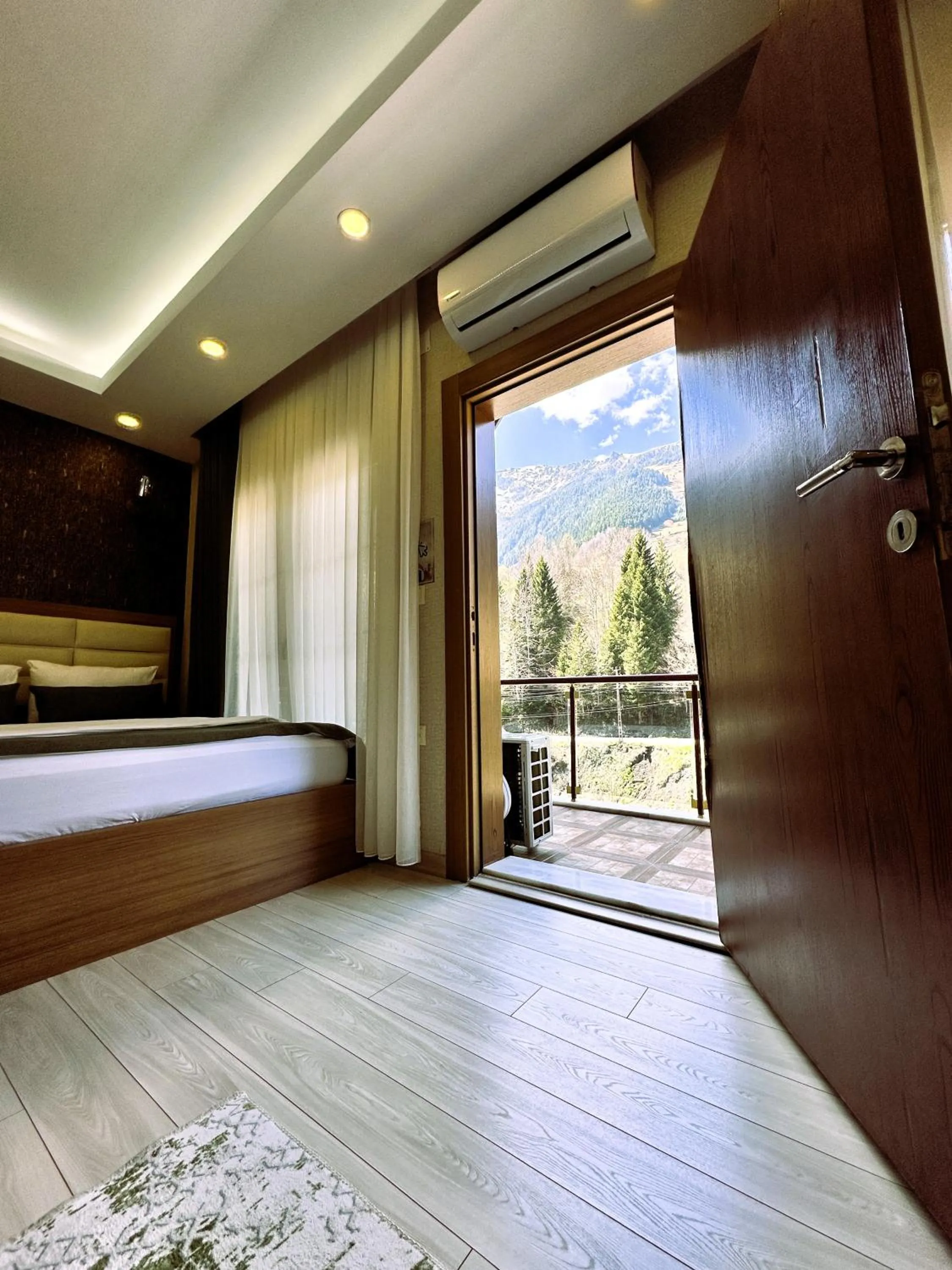 Bed in Green Cinar Apart