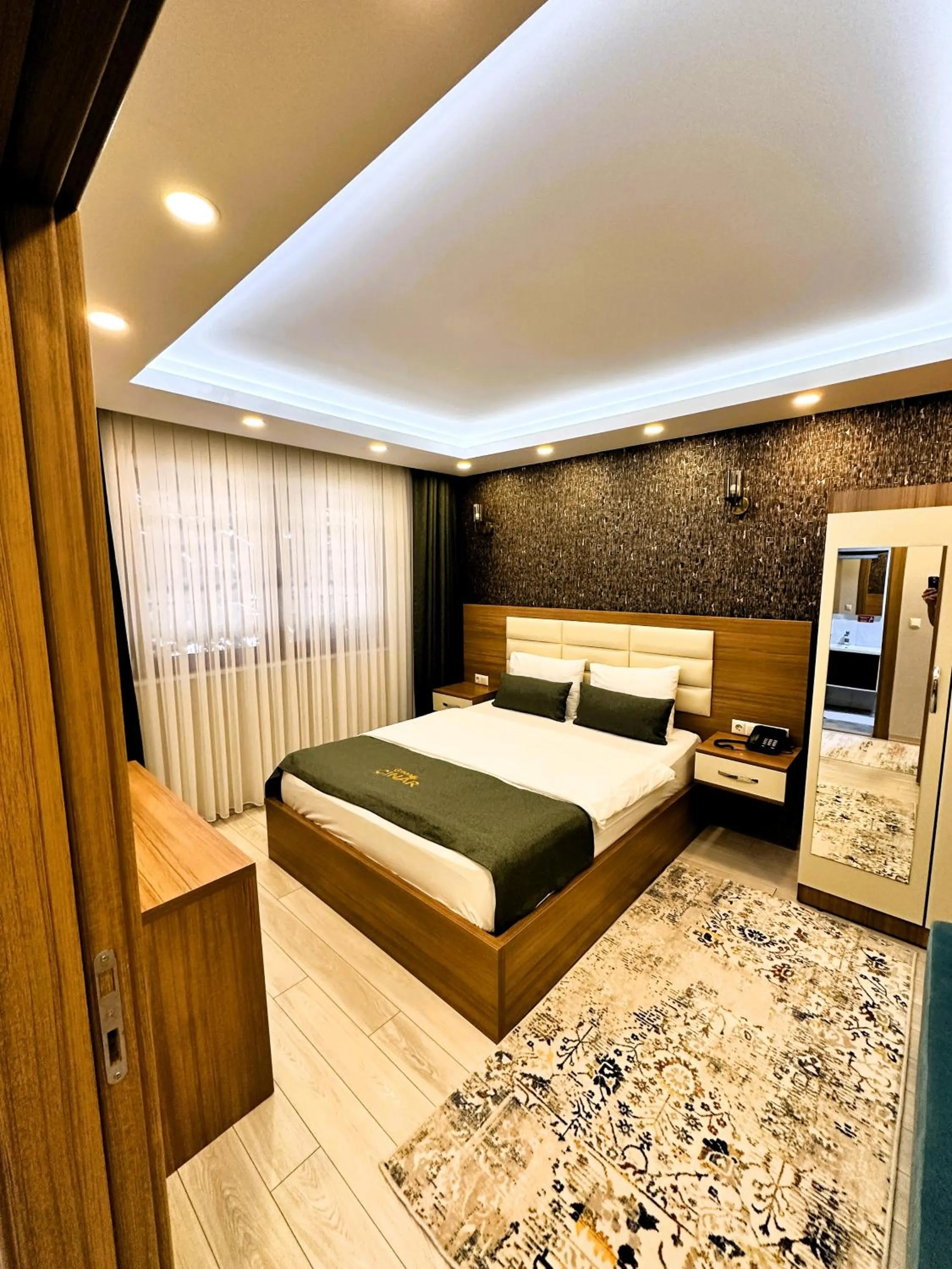 Bed in Green Cinar Apart