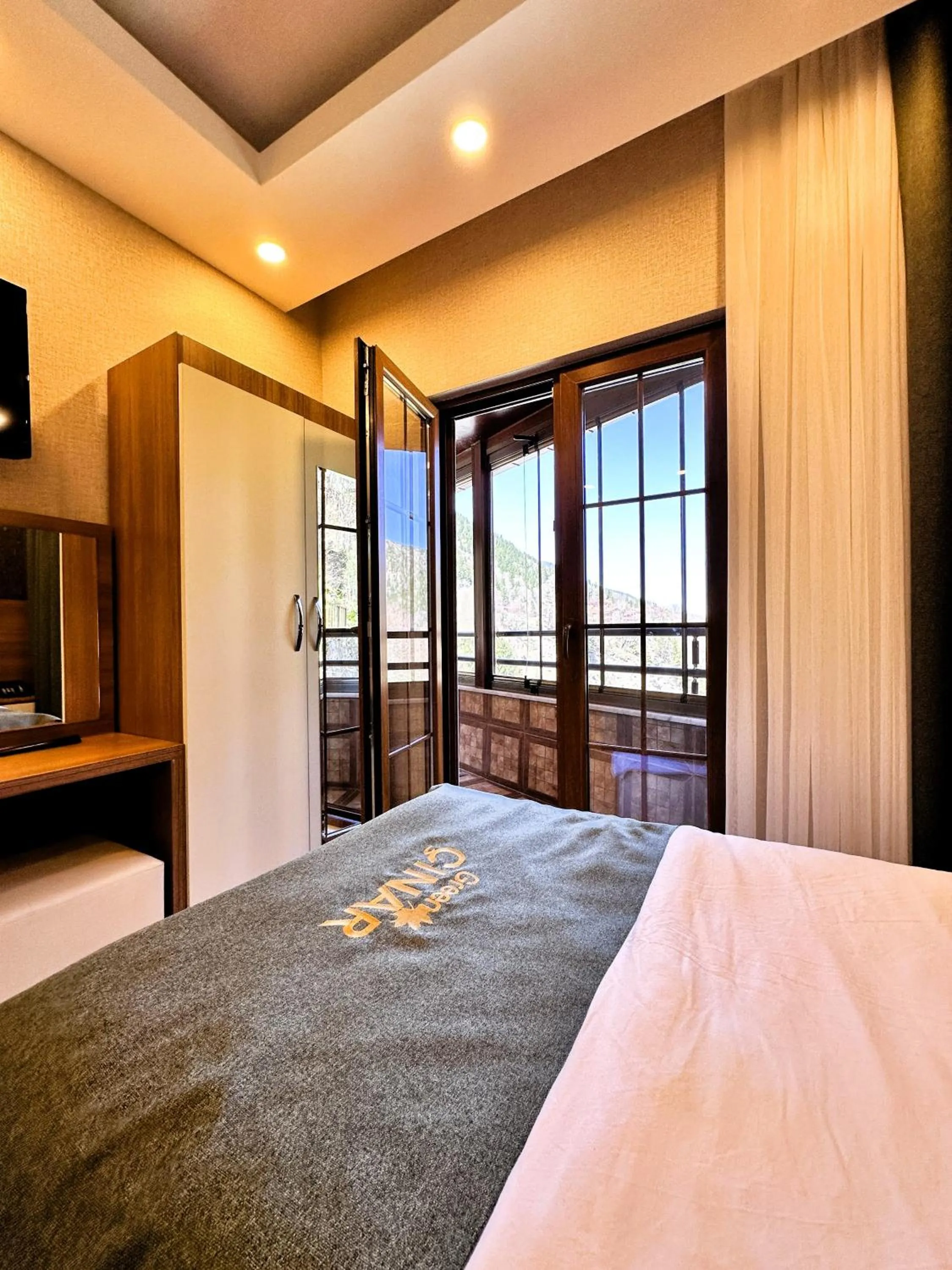 Bed in Green Cinar Apart