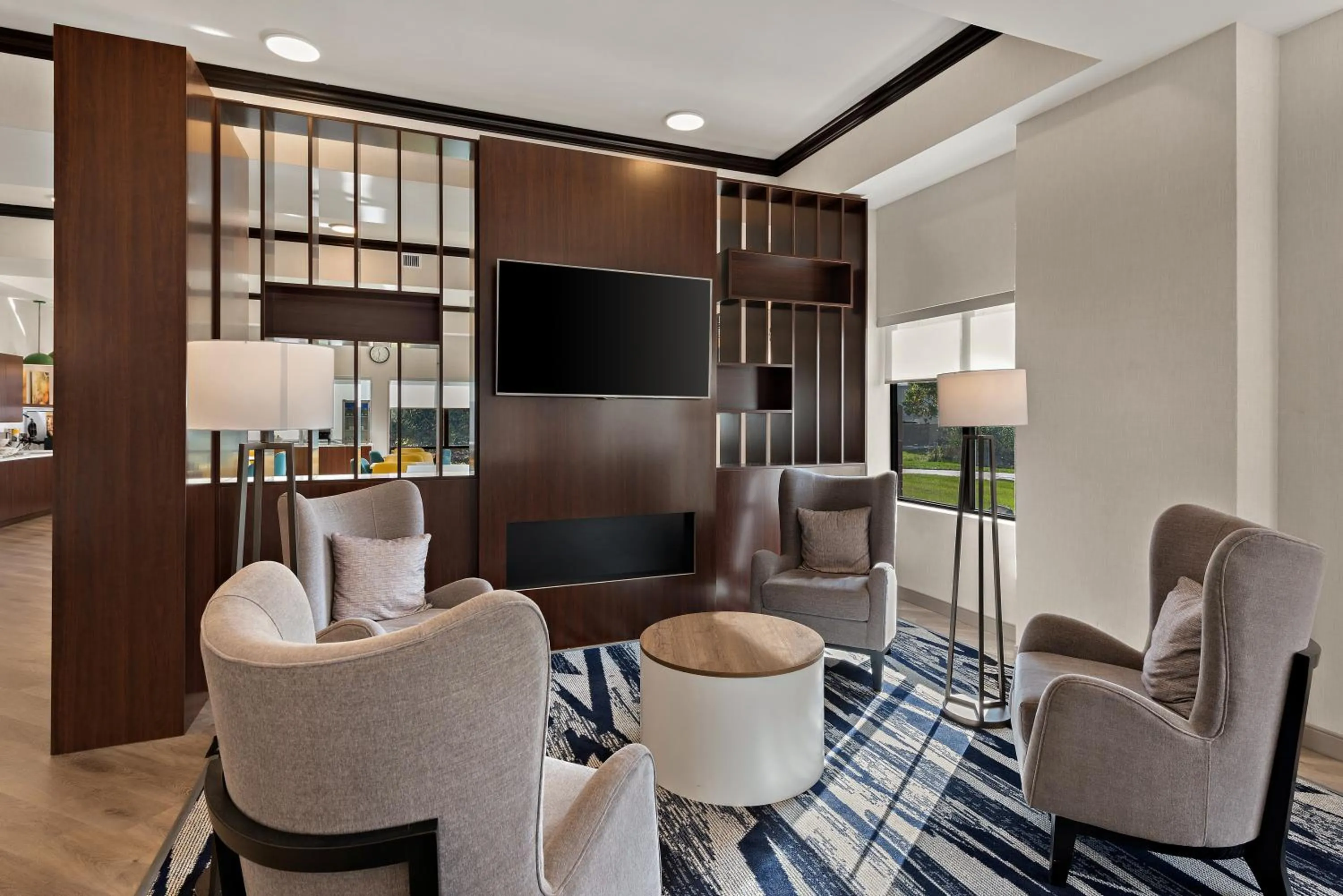 Communal lounge/ TV room in Comfort Suites Columbus East Broad