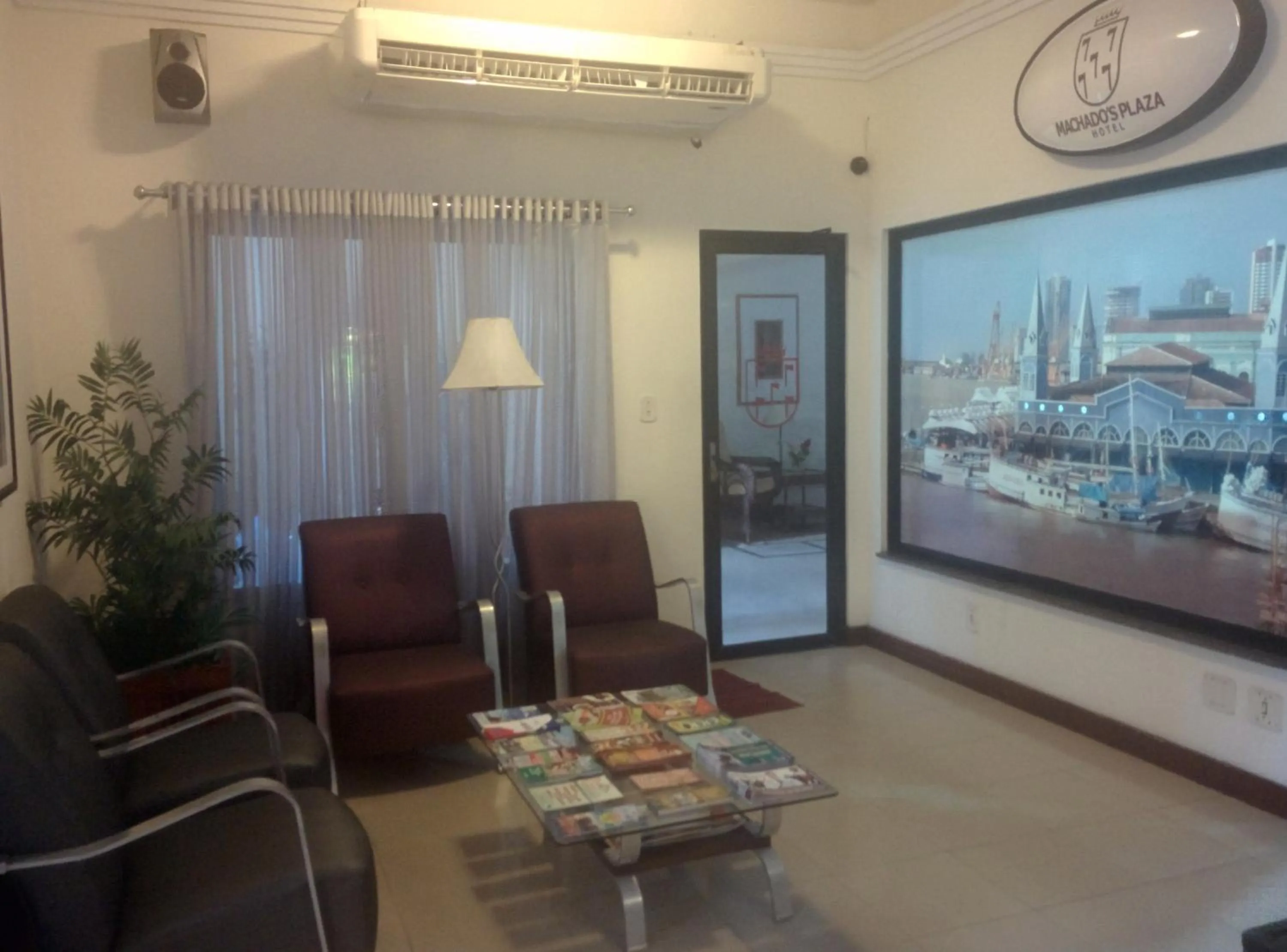 Communal lounge/ TV room in Machado´s Plaza Hotel