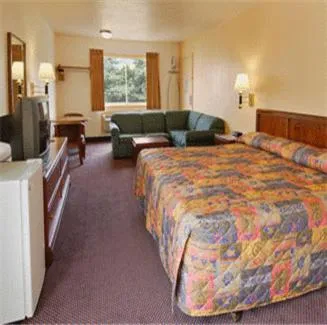 Bedroom in Belmont Inn and Suites