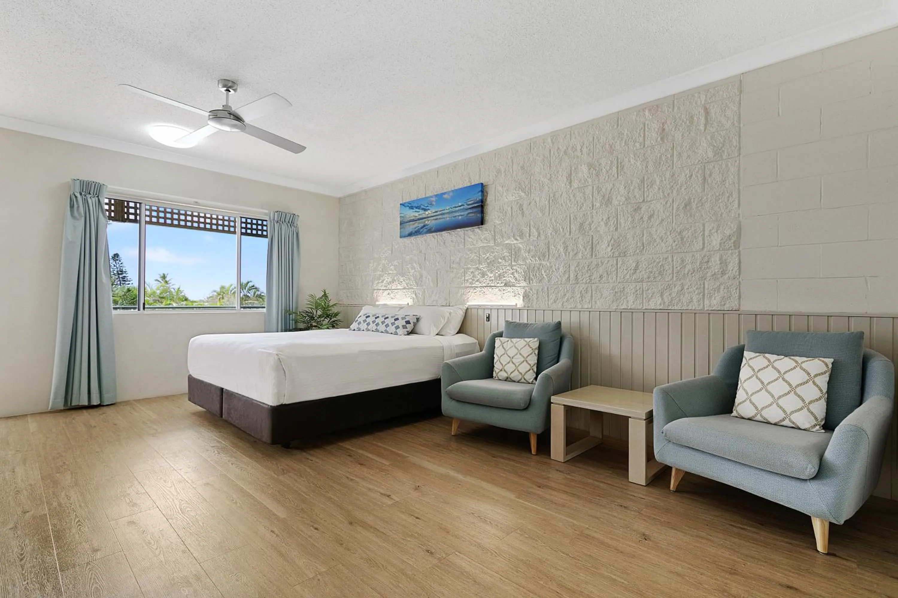 Seating area, Bed in K'gari Beach Resort