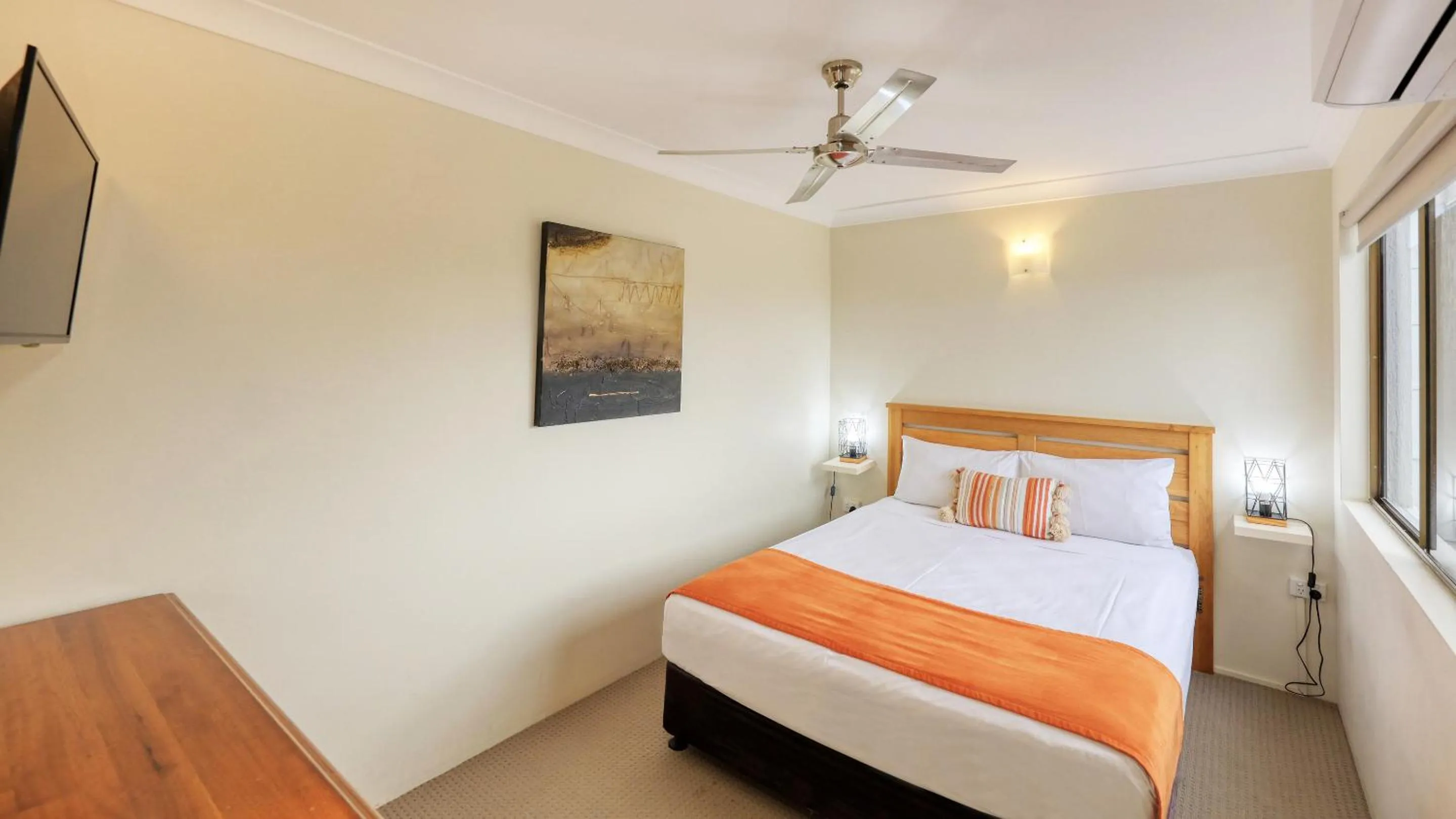 Bed in L'Amor Holiday Apartments