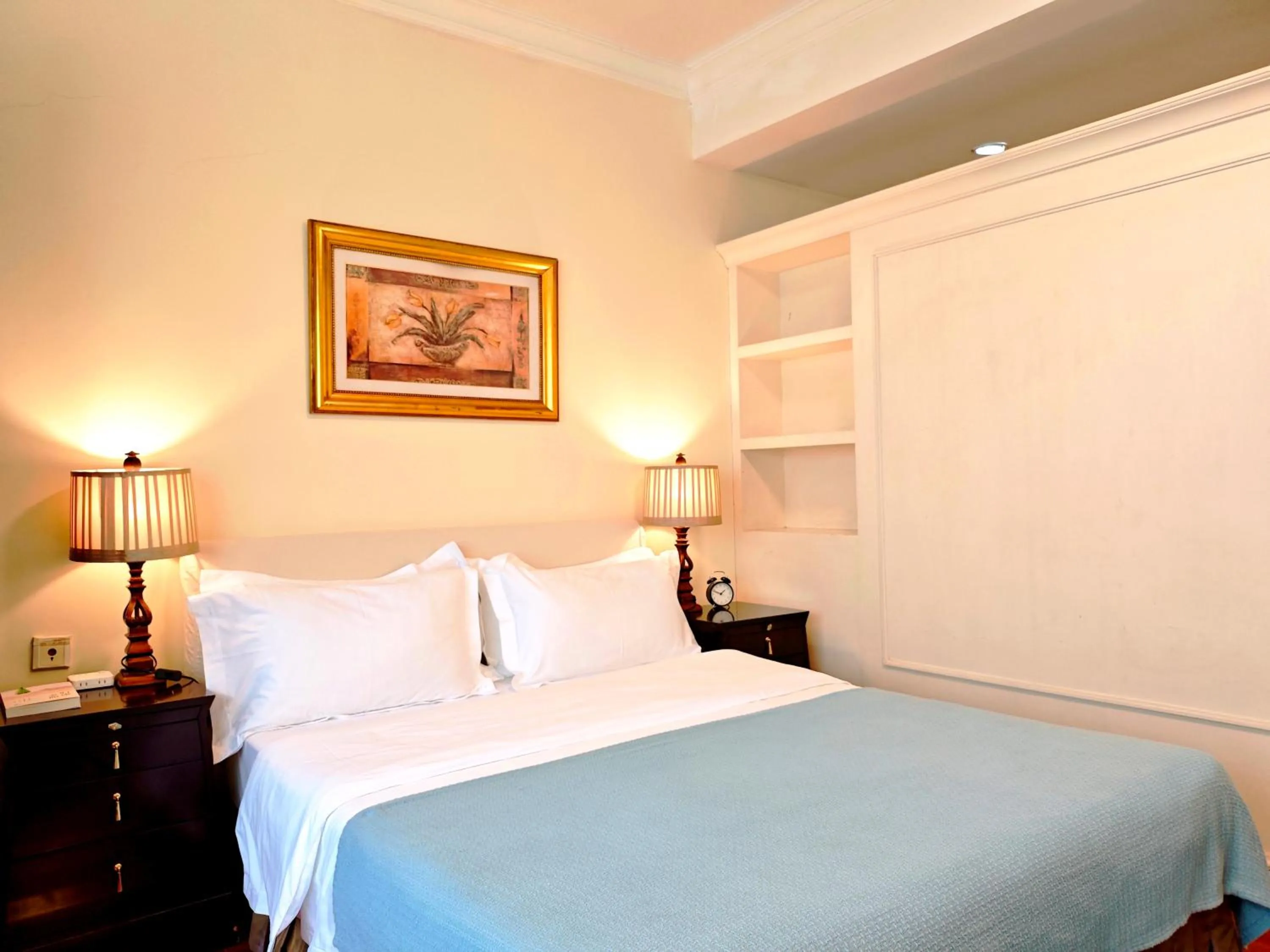 Bed in Ladoll Service Apartments