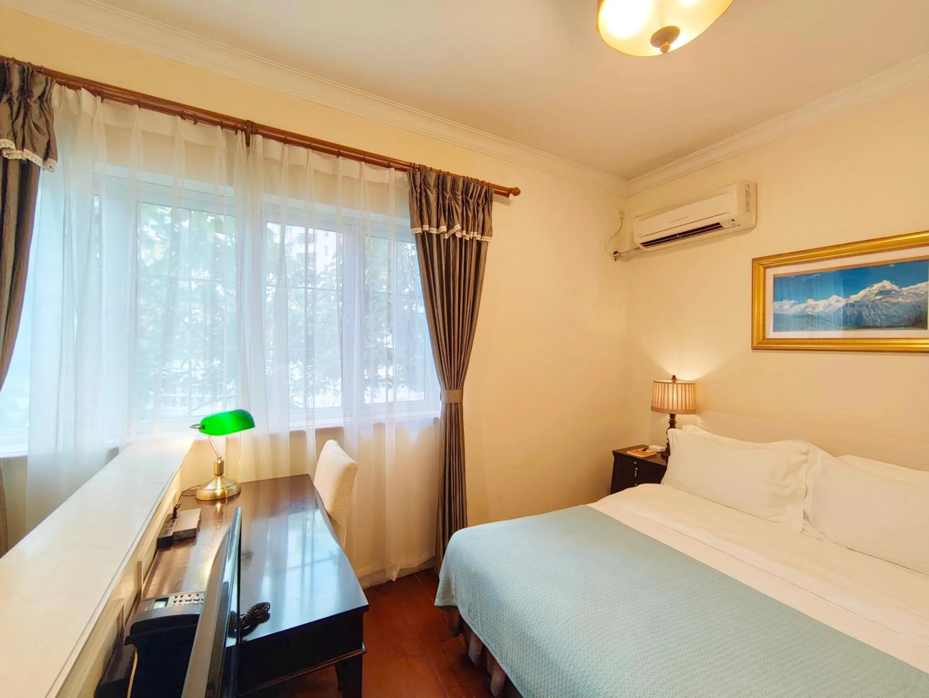 Bed in Ladoll Service Apartments