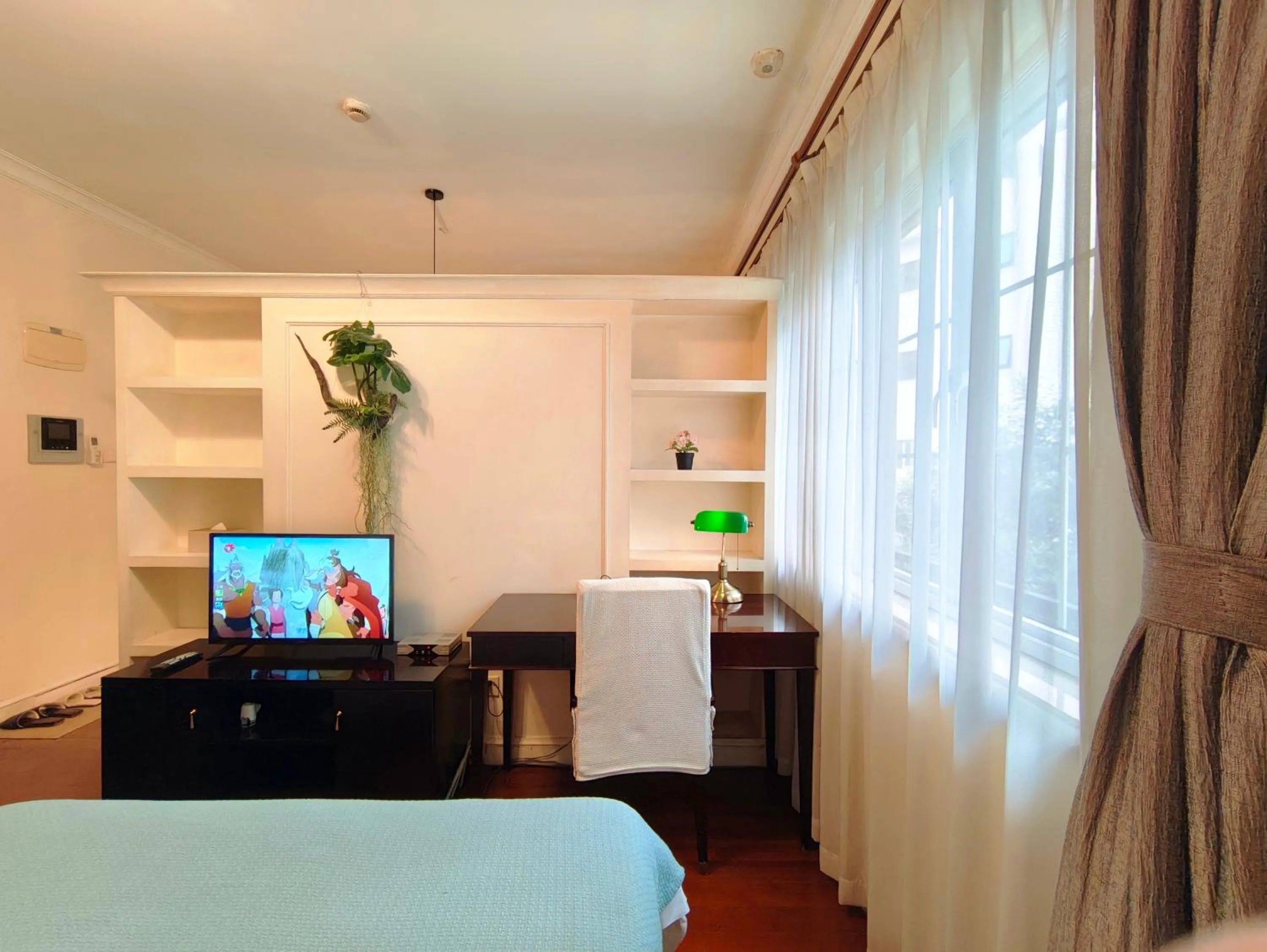 Bed in Ladoll Service Apartments