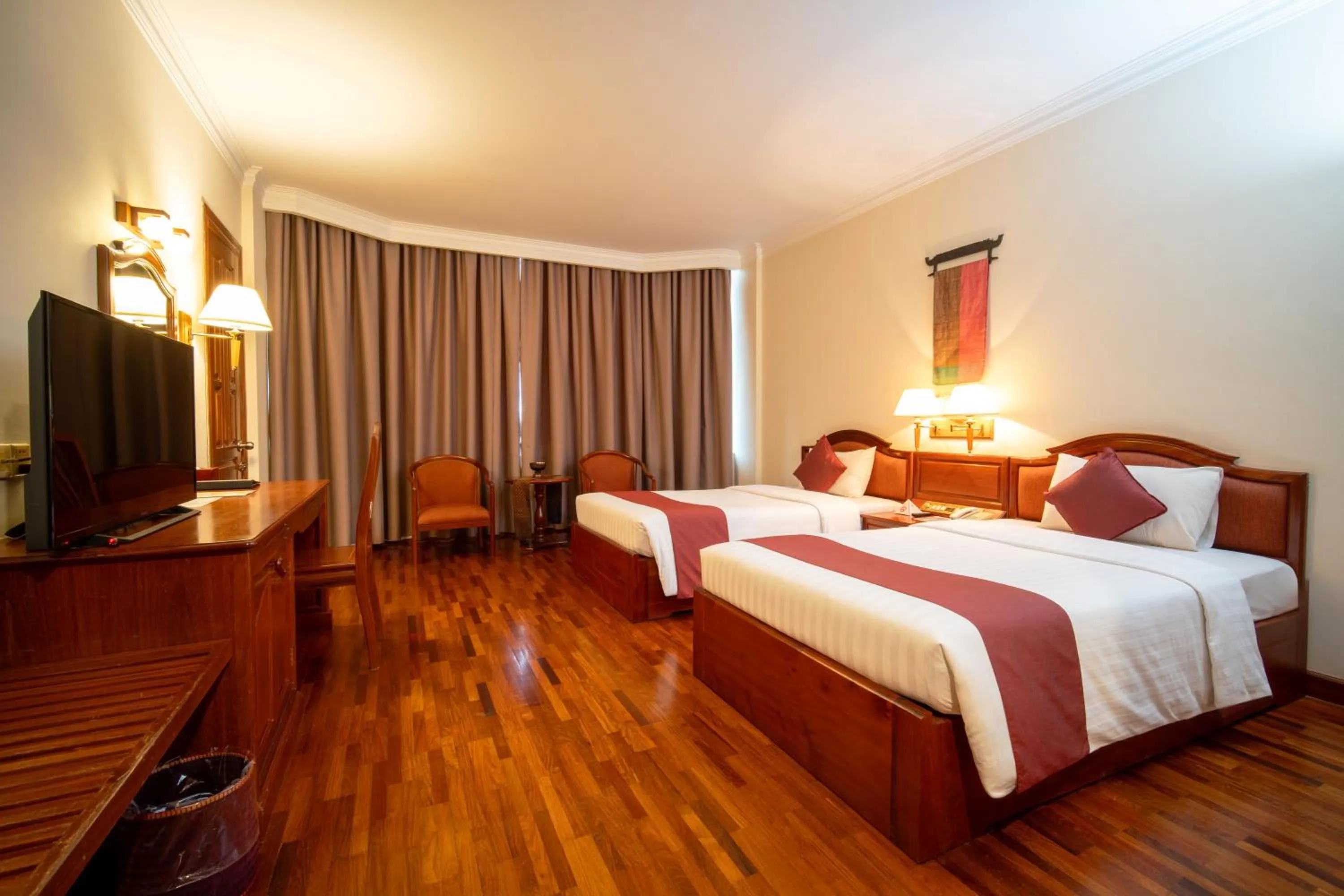 Communal lounge/ TV room, Bed in Khemara Angkor Hotel & Spa