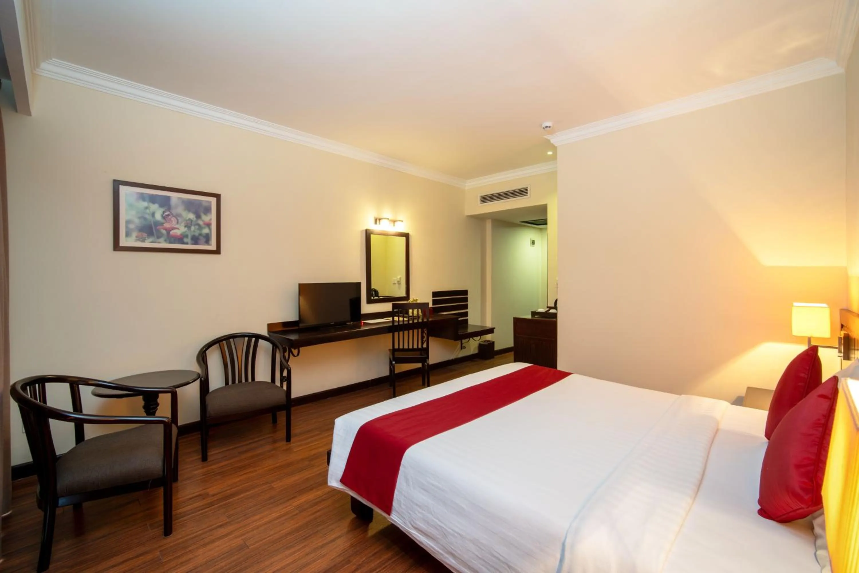 Bed in Khemara Angkor Hotel & Spa